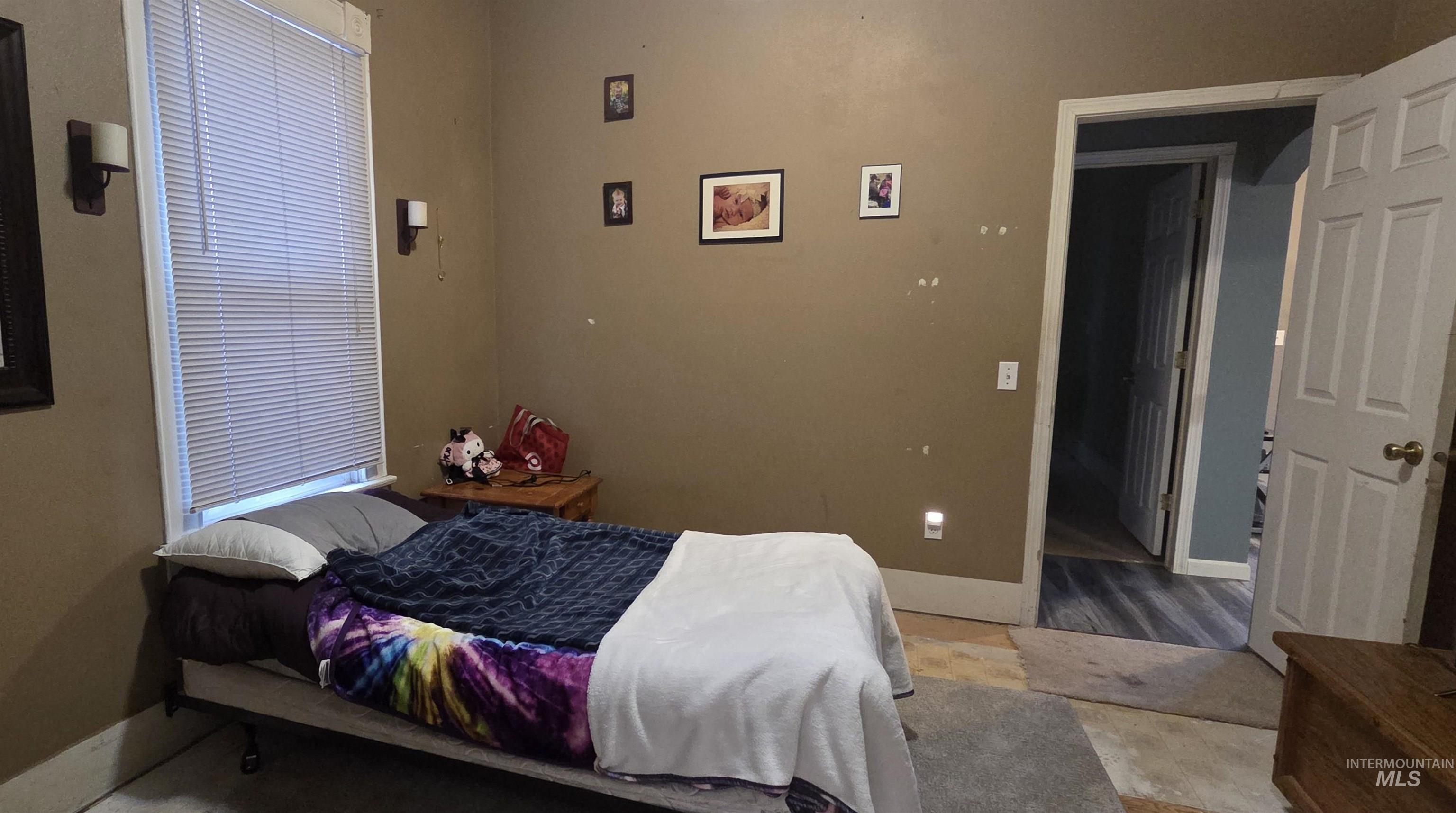 Bedroom featuring baseboards
