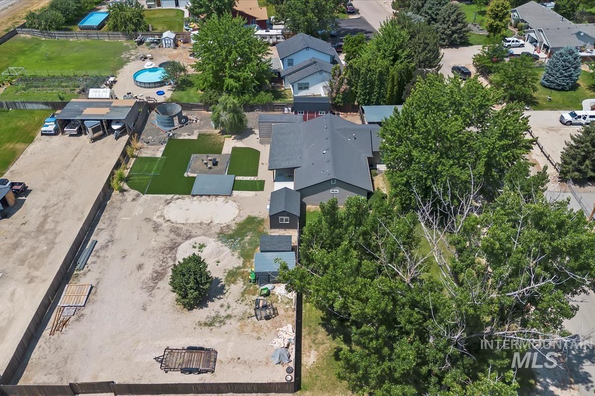 Aerial overview of property's location with nearby suburban area