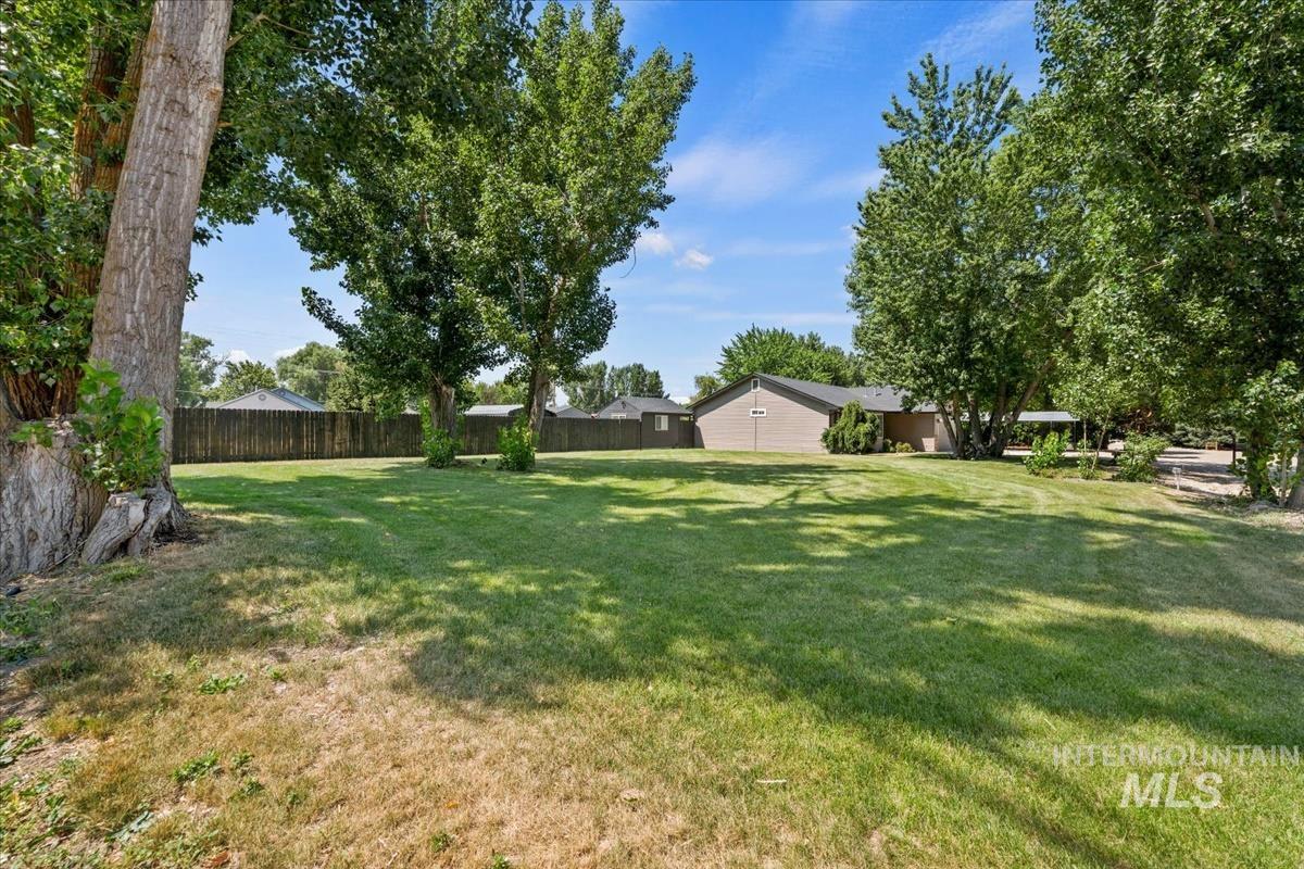 View of fenced backyard