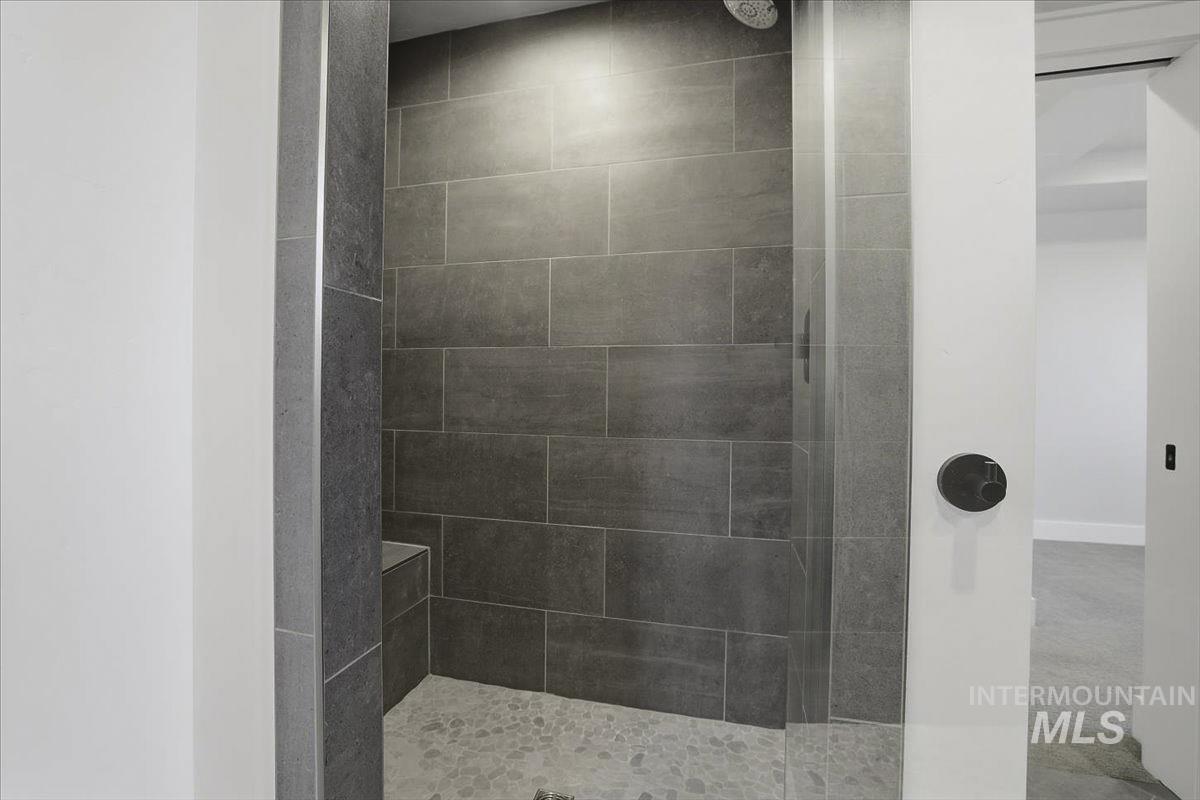 Bathroom with tiled shower