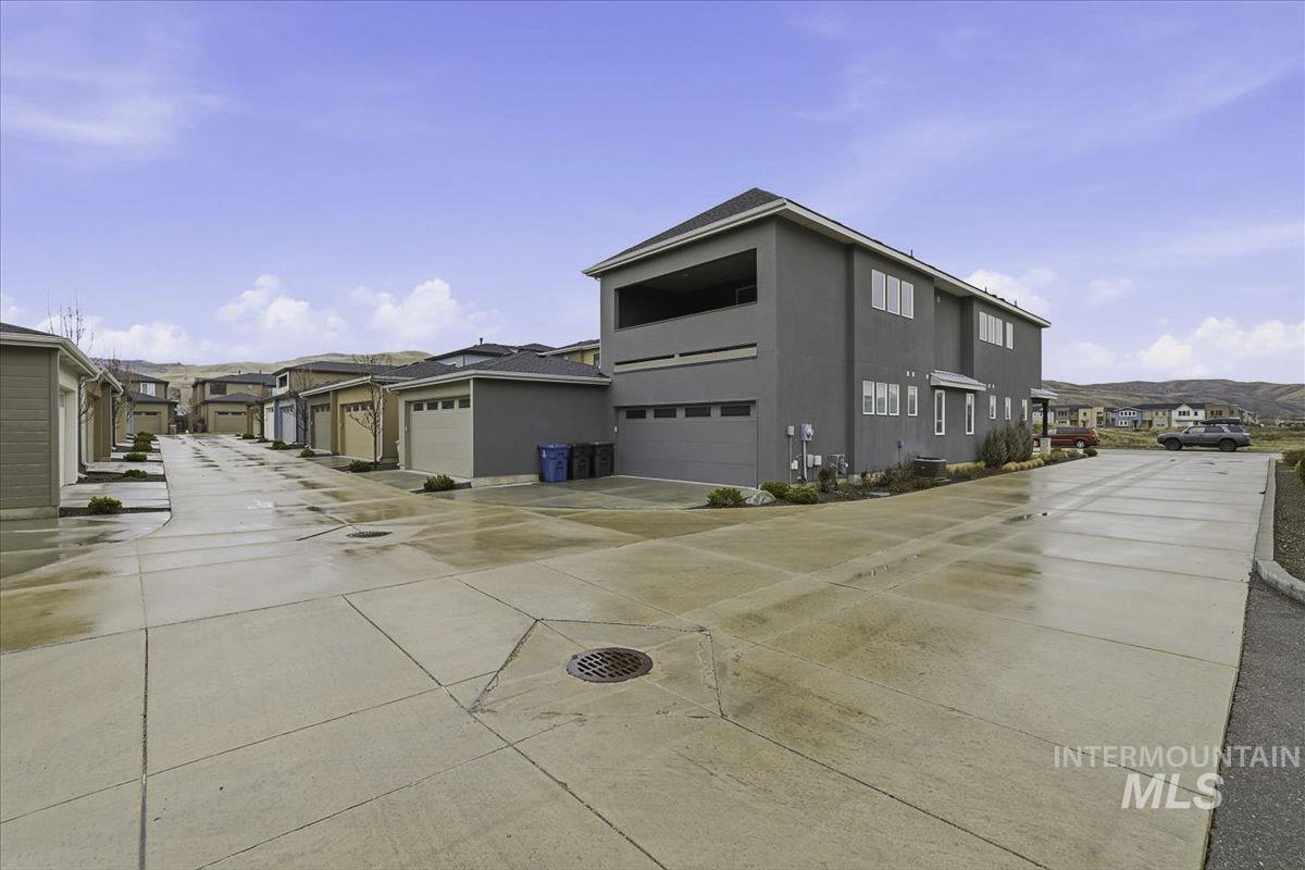 View of concrete road featuring a residential view