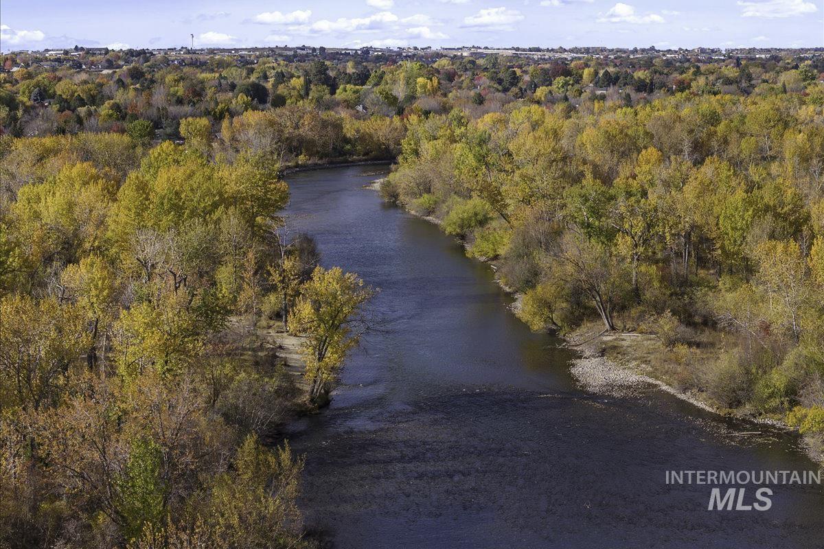 Aerial view of a large body of water and a heavily wooded area