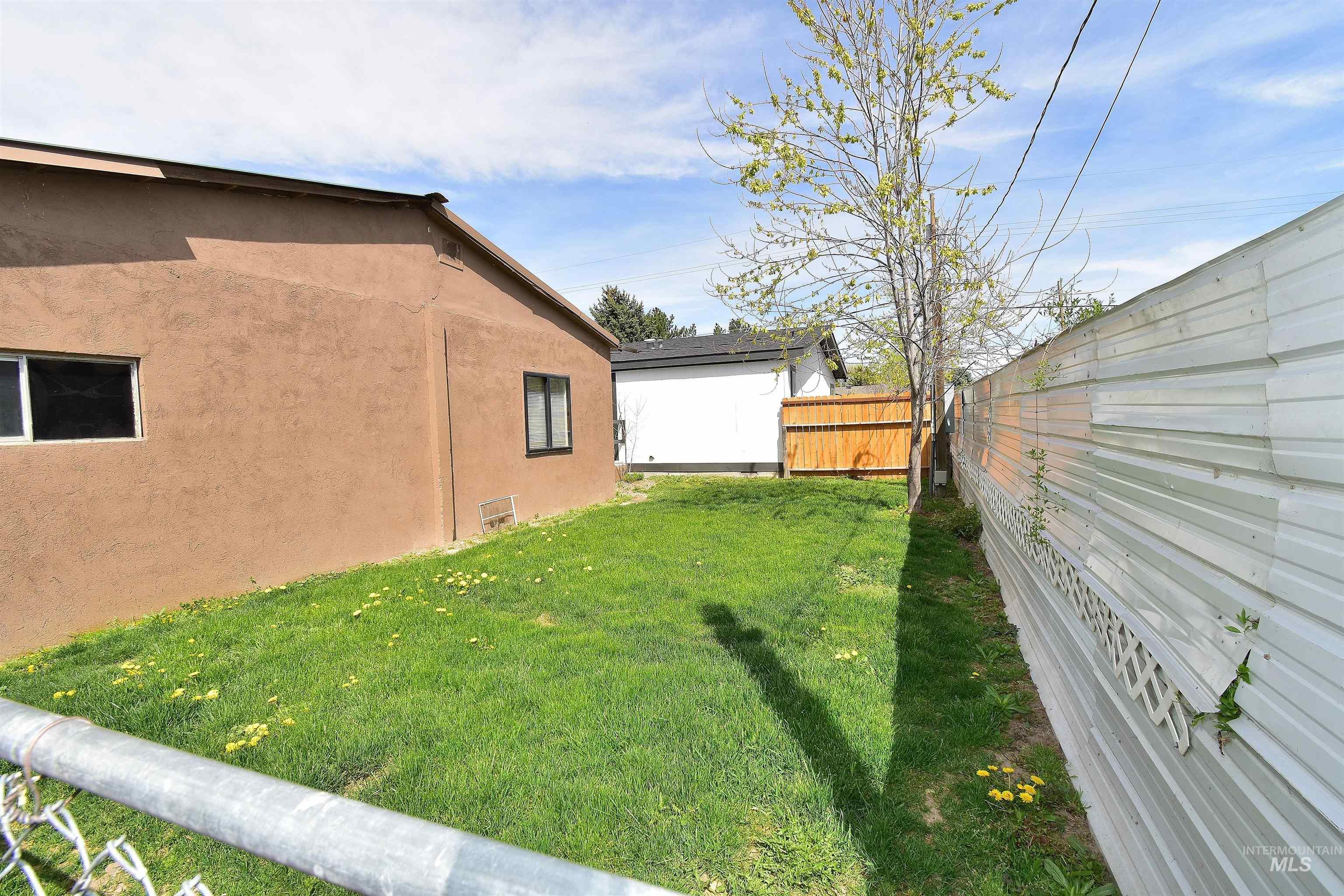 View of fenced backyard
