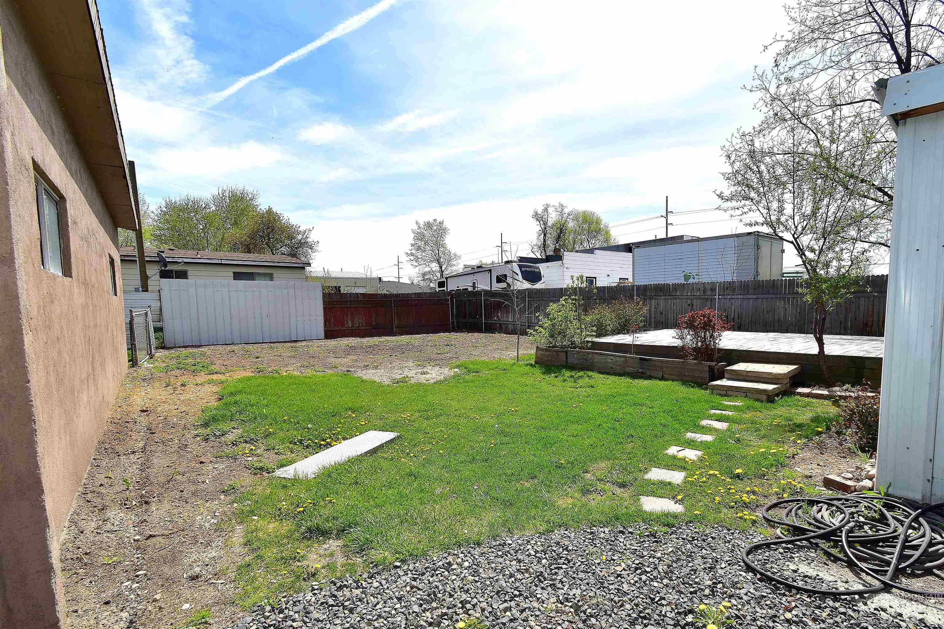 View of fenced backyard
