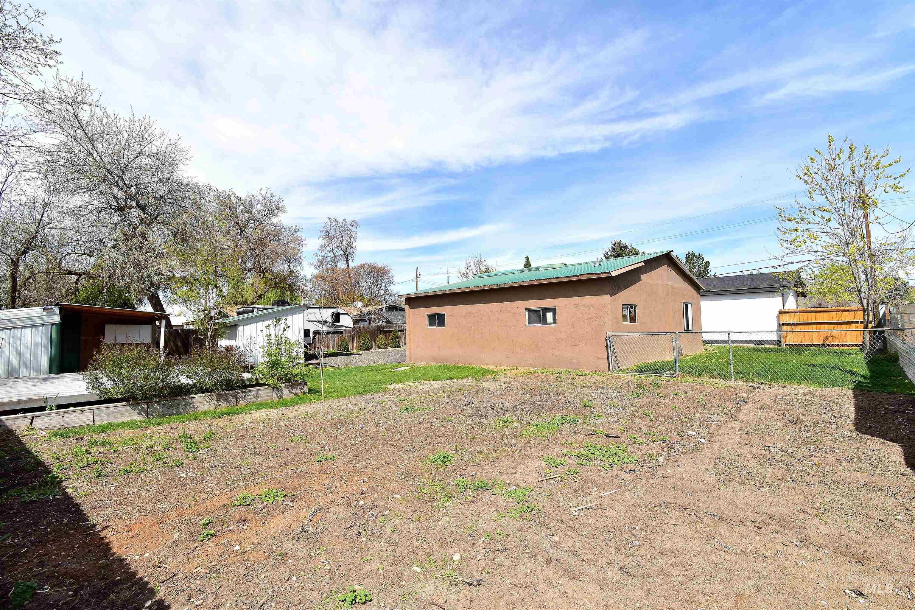 View of side of property featuring stucco siding