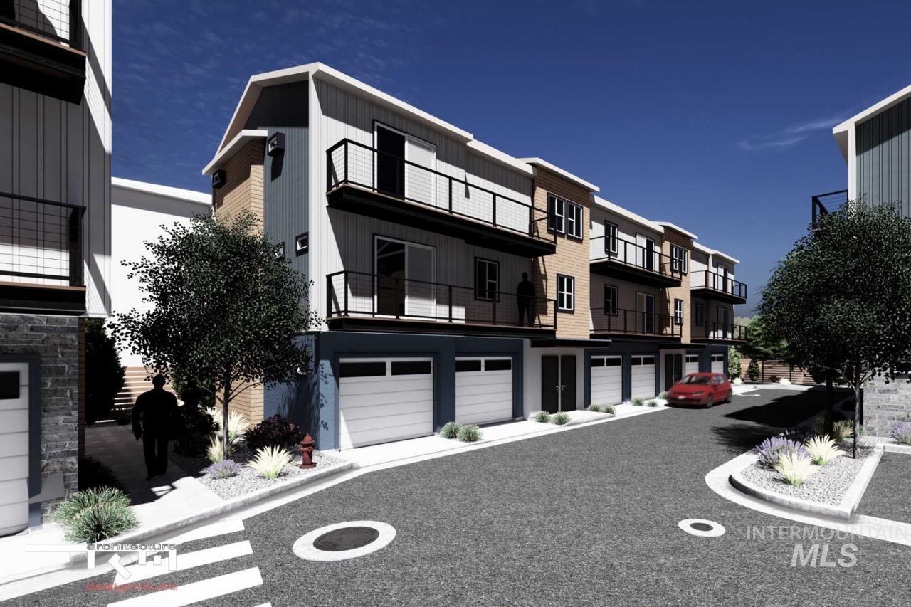 View of building exterior featuring a garage