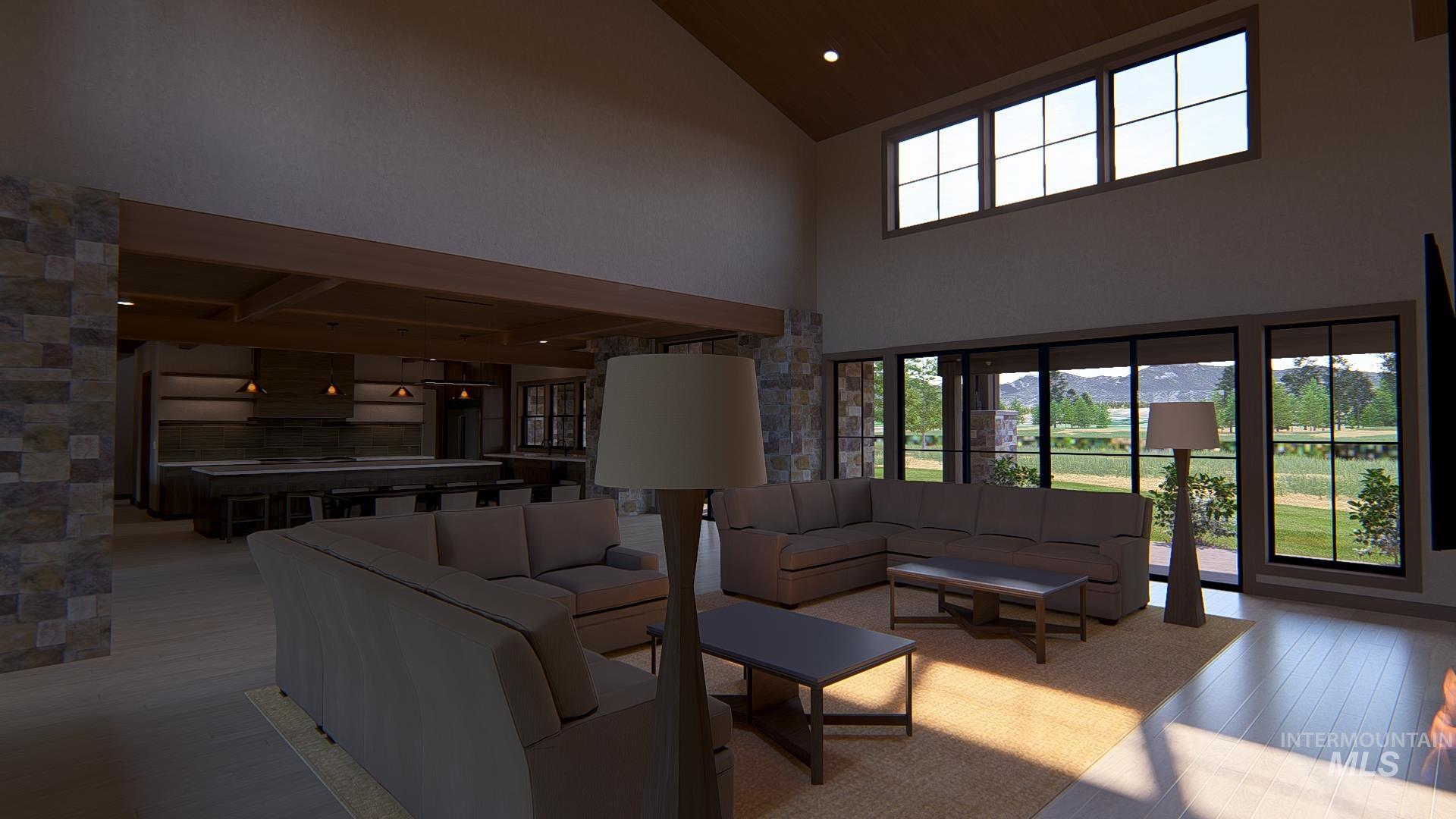 Living area featuring light wood-type flooring, high vaulted ceiling, and recessed lighting