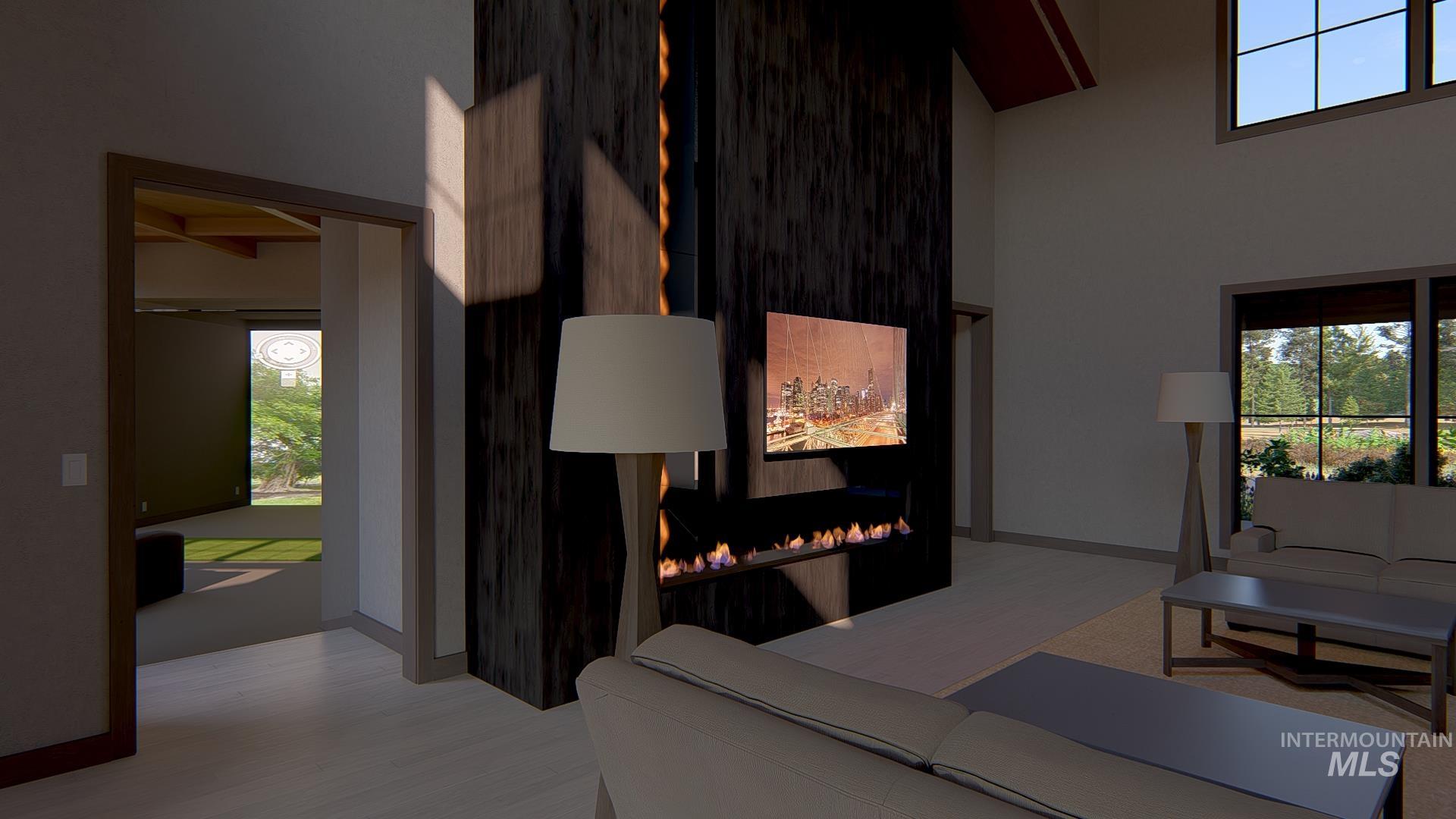 Living room with a high ceiling and a warm lit fireplace