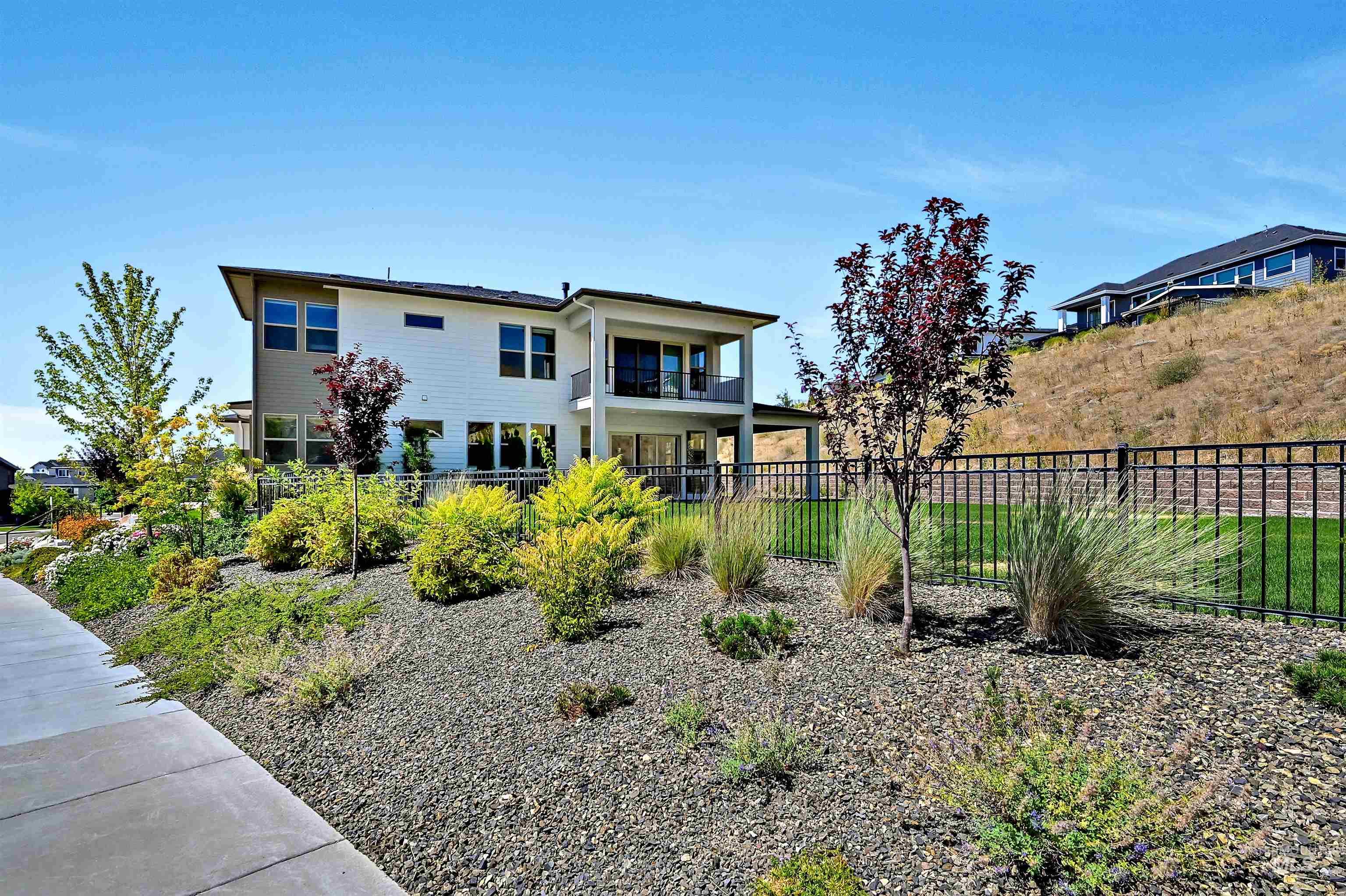 Back of property featuring a balcony