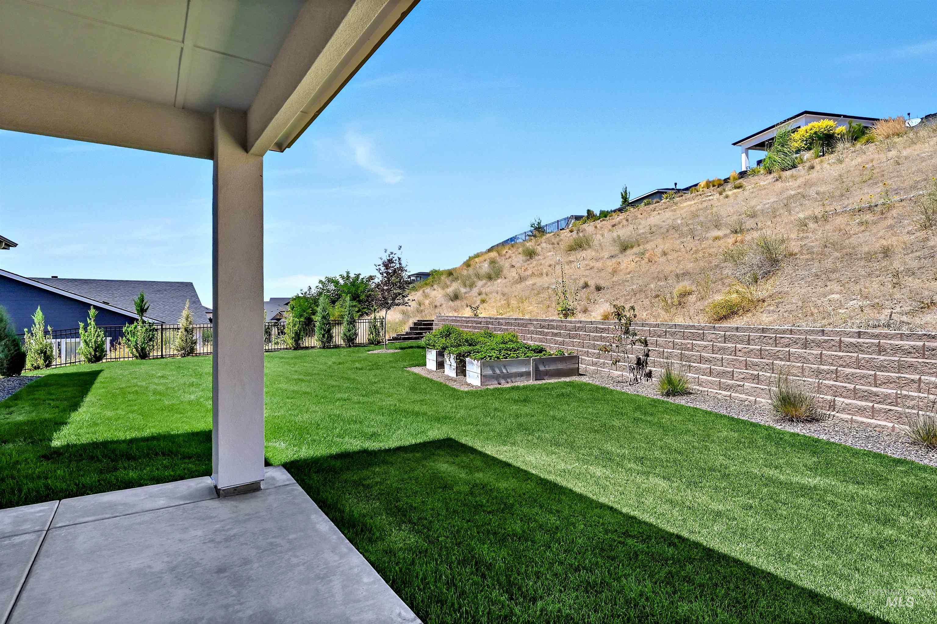 Fenced backyard featuring a patio area