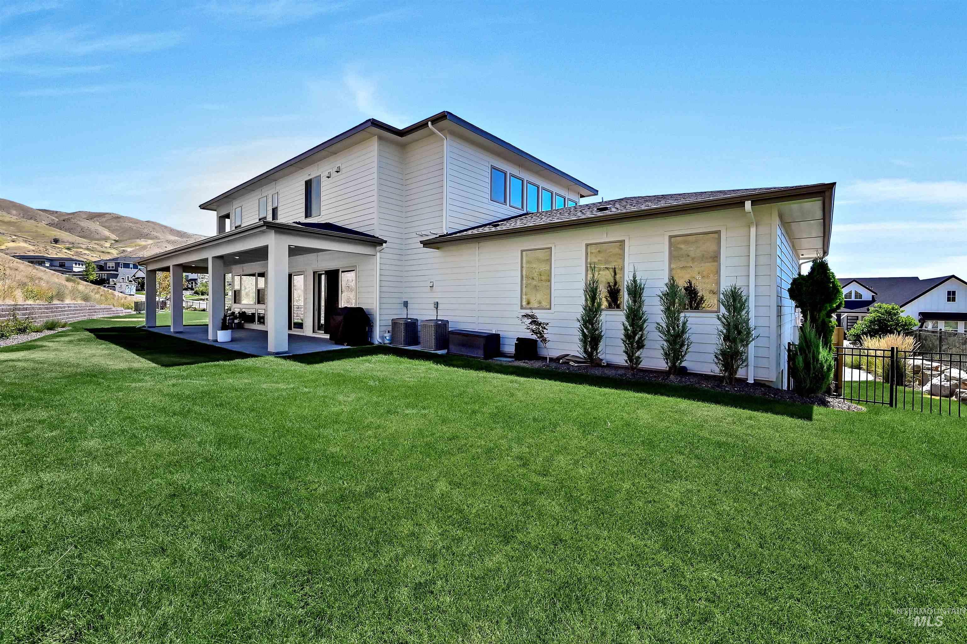 Back of property featuring a patio area