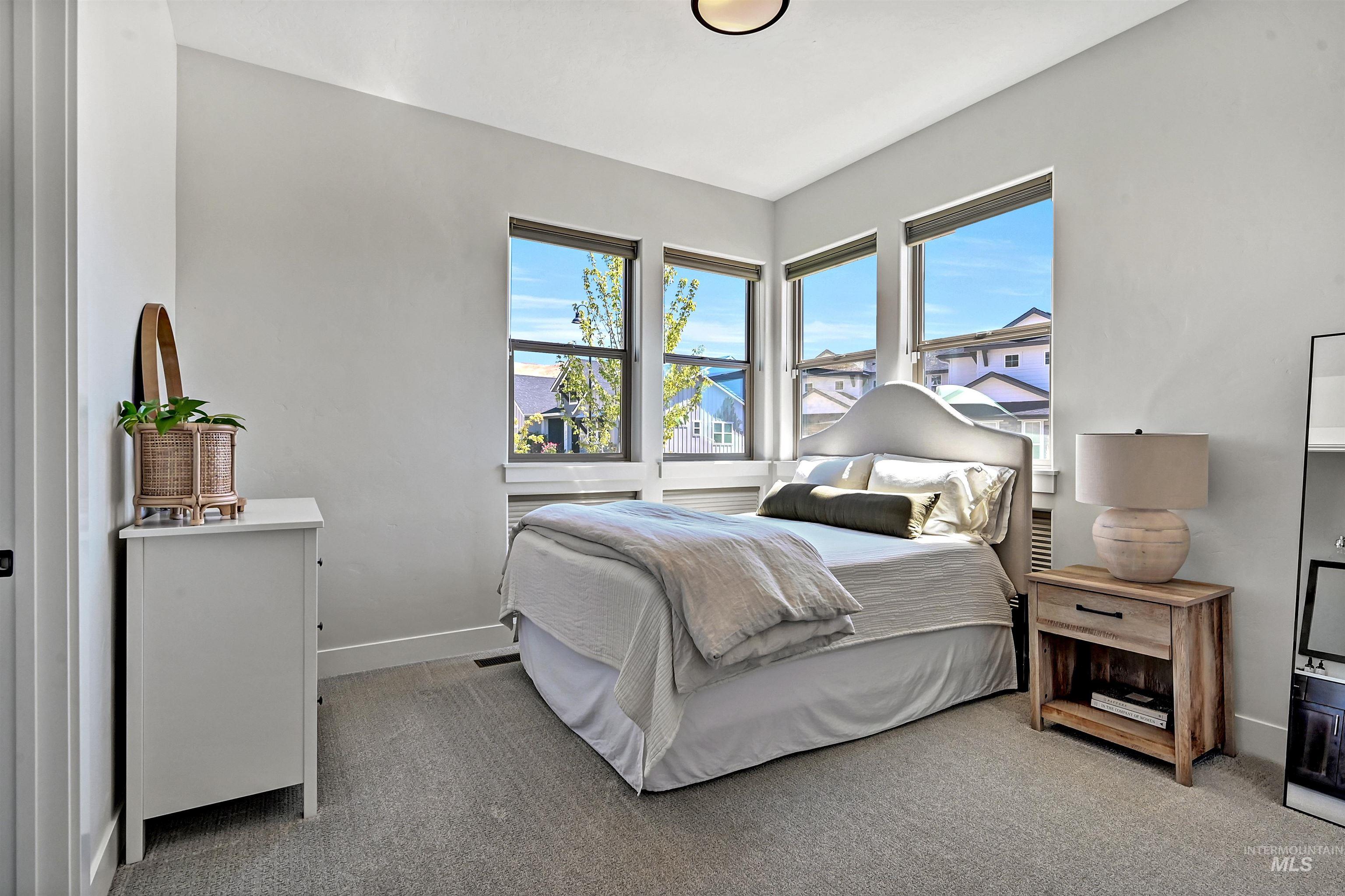 Bedroom featuring carpet floors