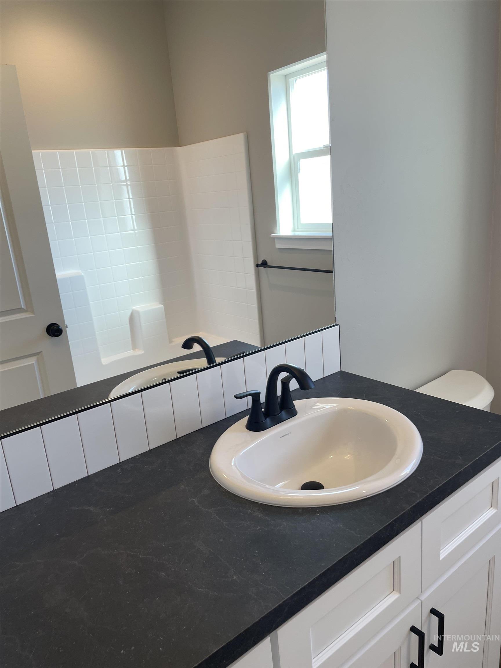 Bathroom featuring vanity