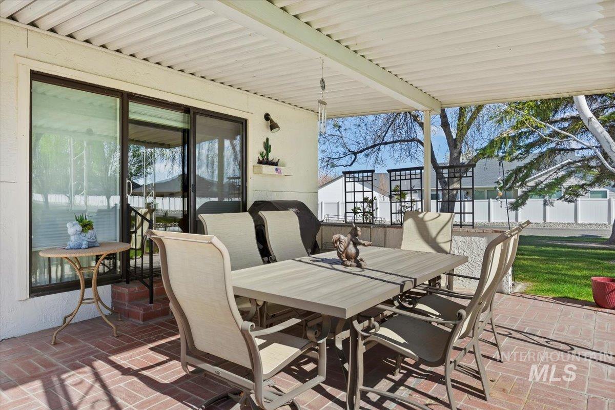 View of patio with outdoor dining space