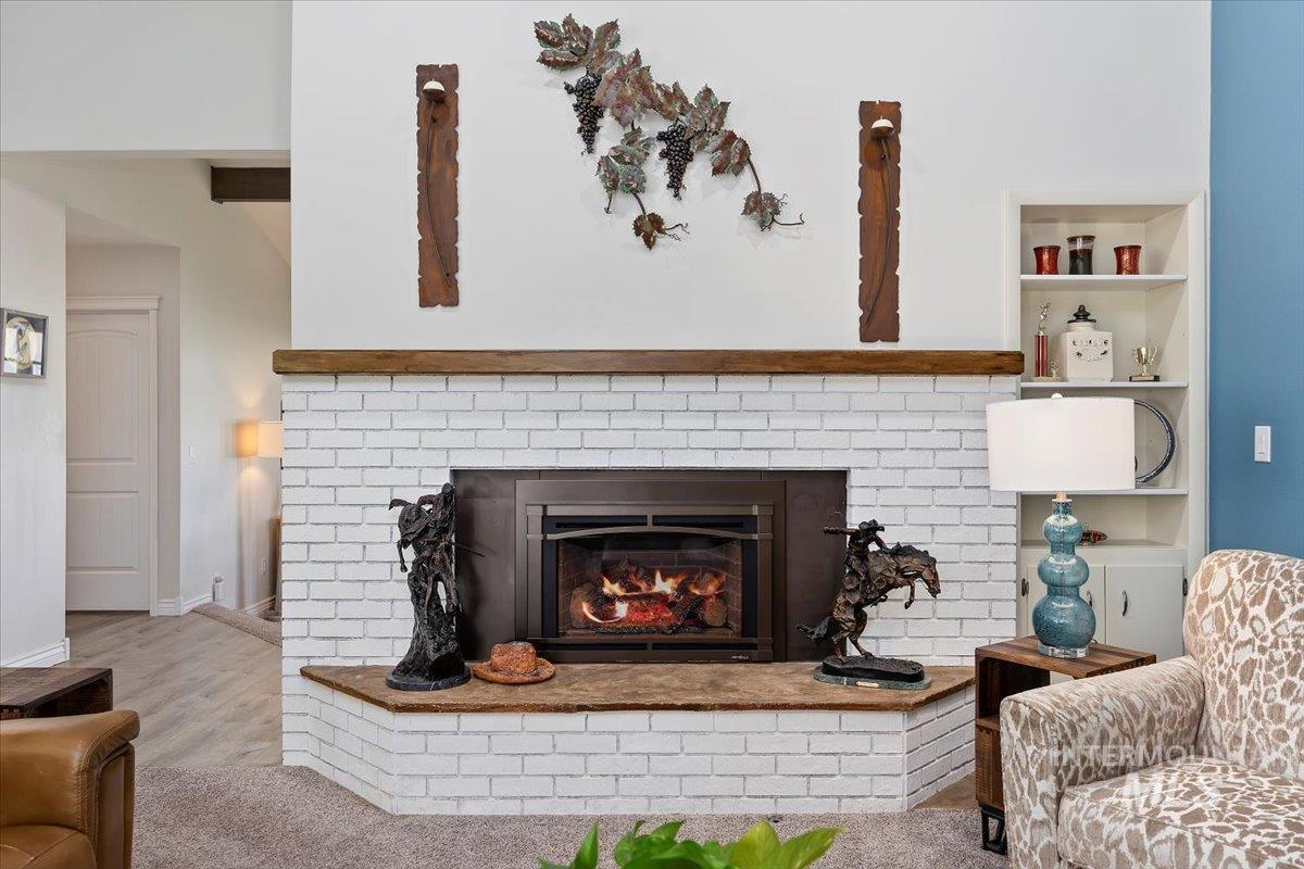 Detailed view of a fireplace and built in shelves