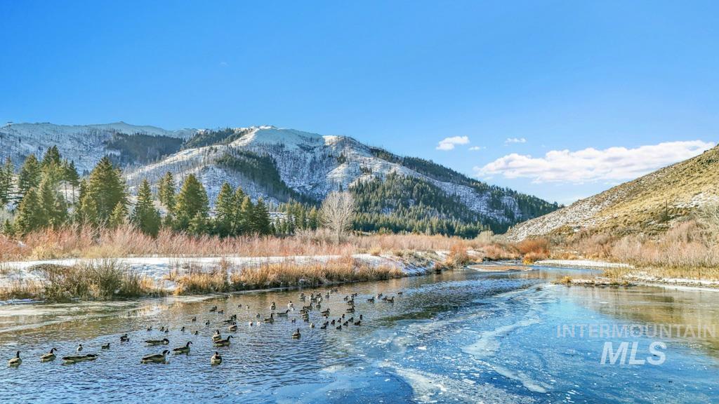 Water view with a mountainous background