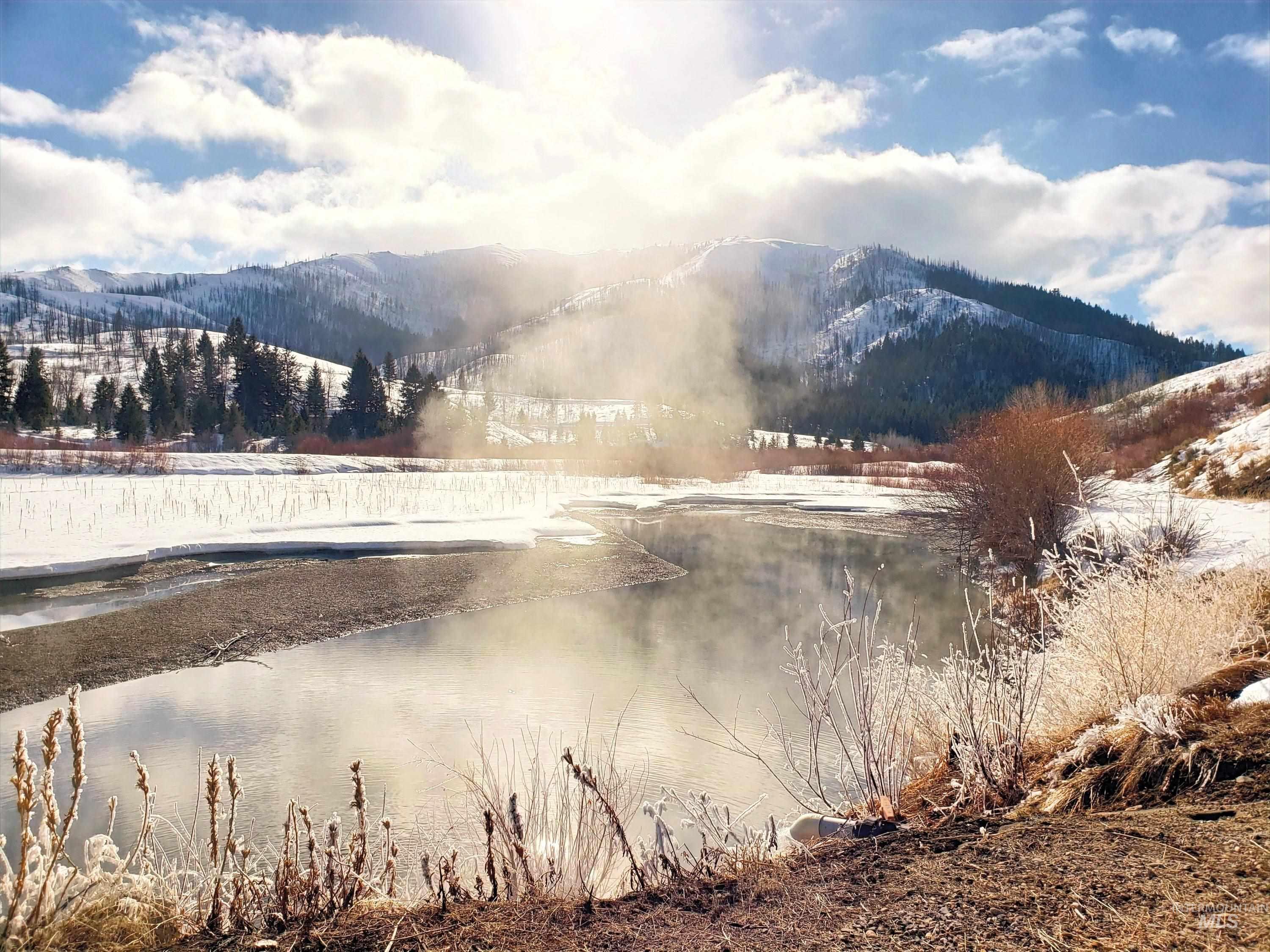 Water view featuring a mountain backdrop