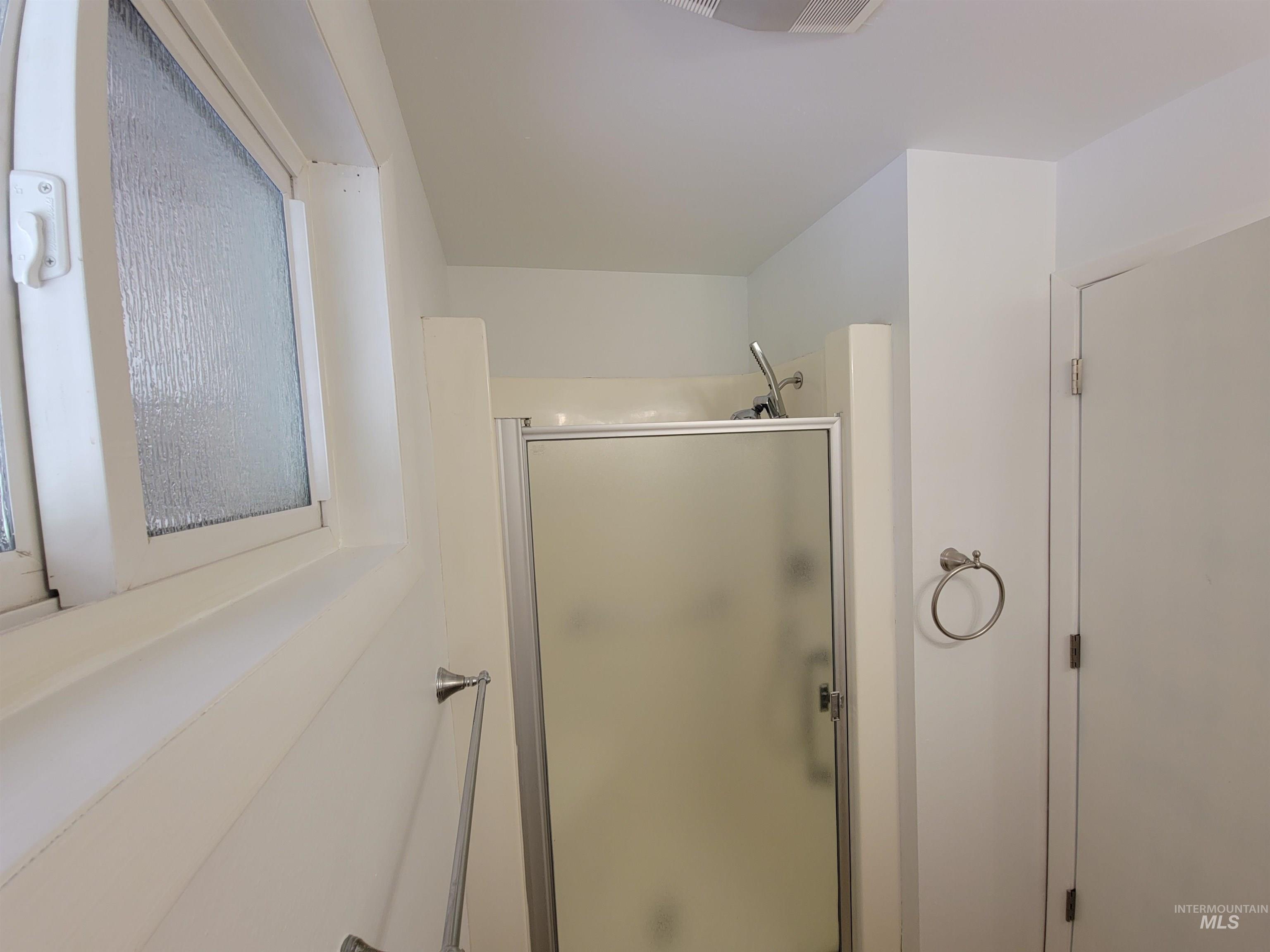 Bathroom with a shower stall