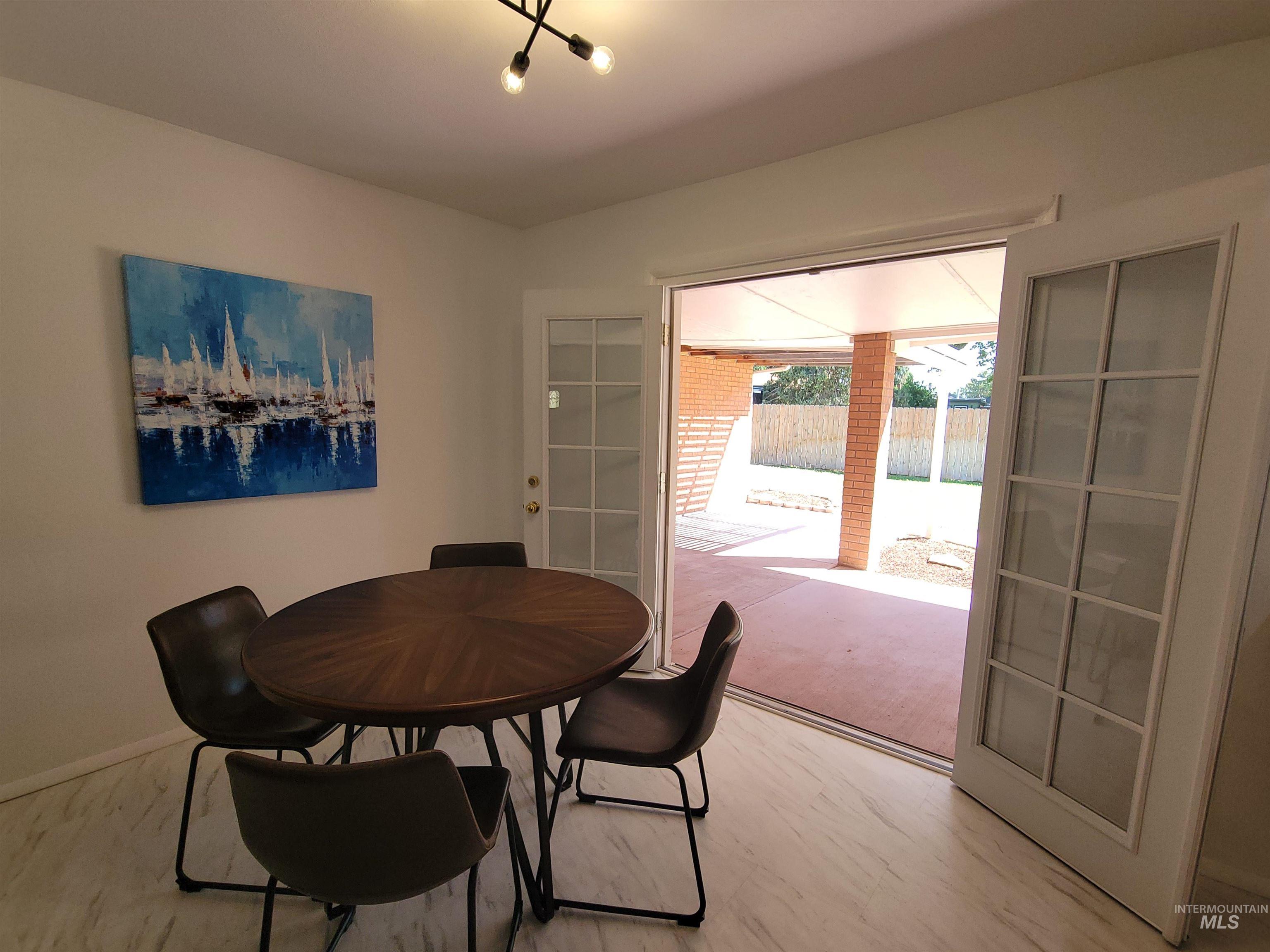 Dining area featuring french doors