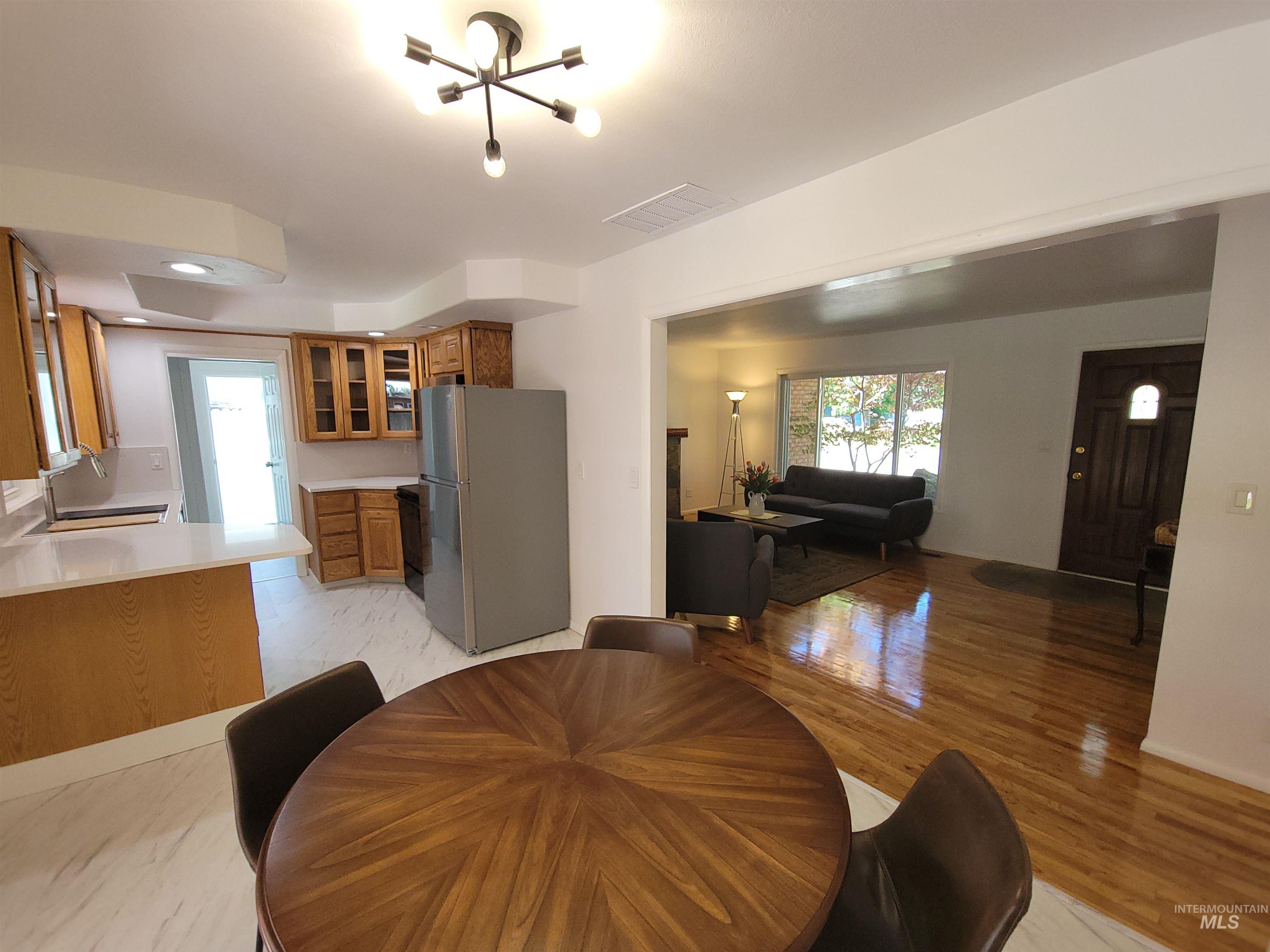 Dining area with a chandelier