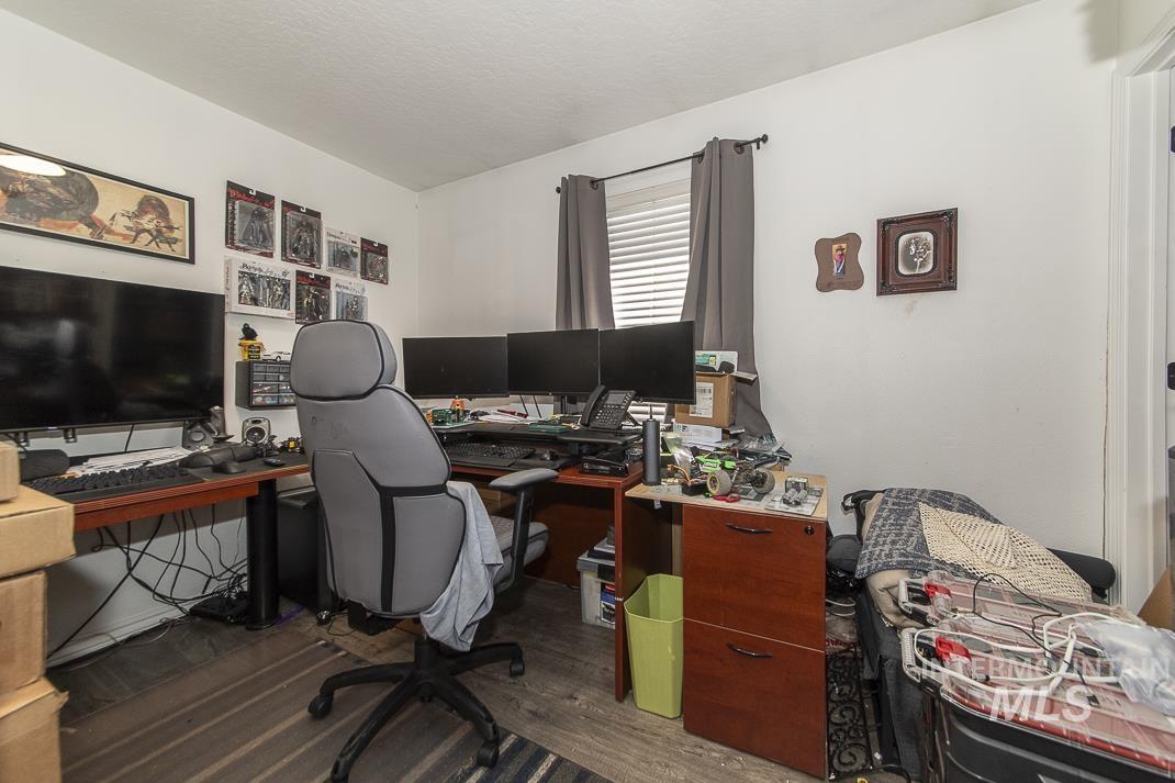 Office featuring dark wood finished floors