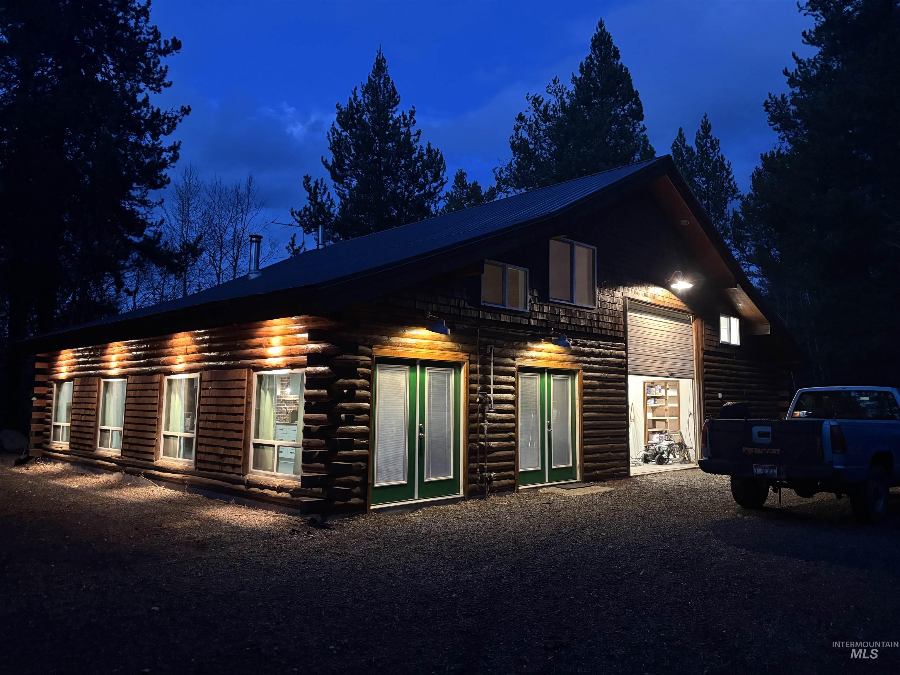 Log cabin featuring log exterior