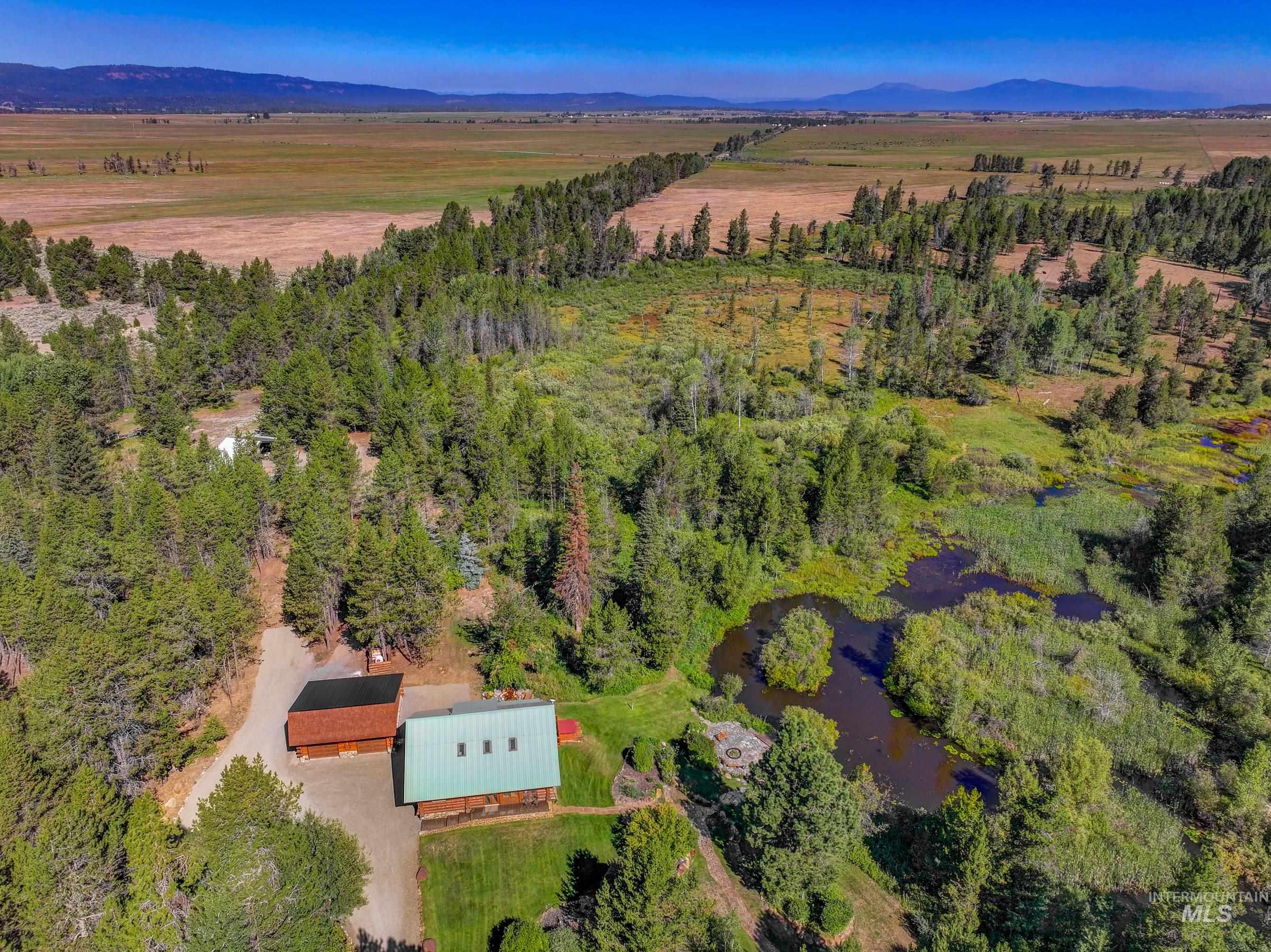 View of property location featuring a water and mountain view