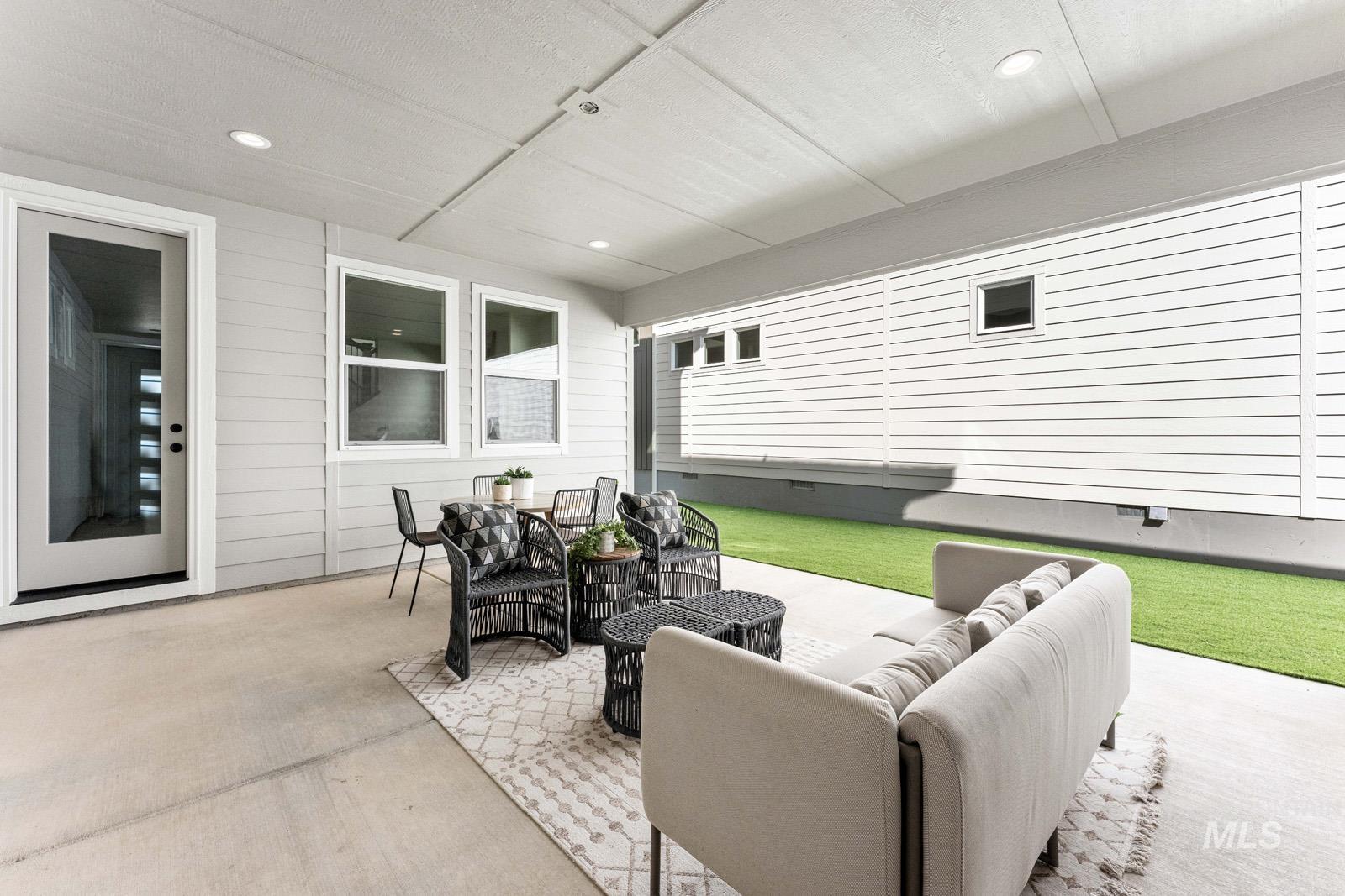 View of patio featuring an outdoor hangout area
