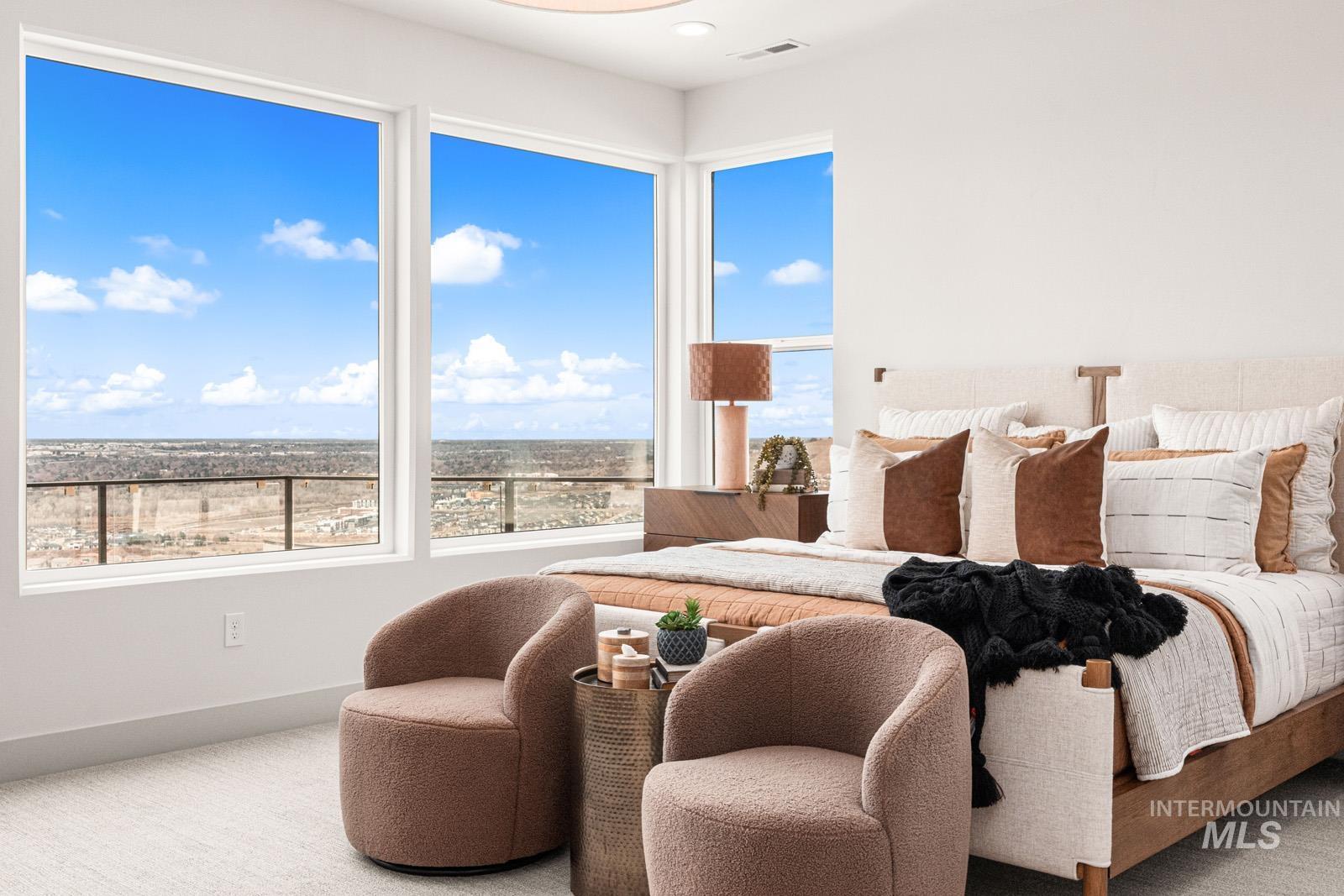 Carpeted bedroom featuring baseboards
