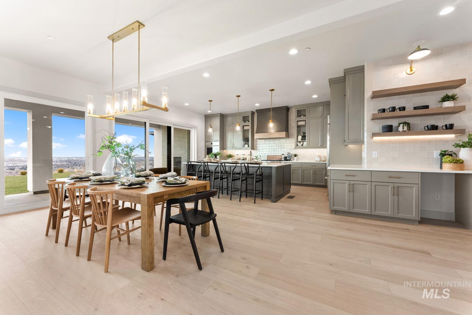 Dining space featuring light wood-style floors and recessed lighting