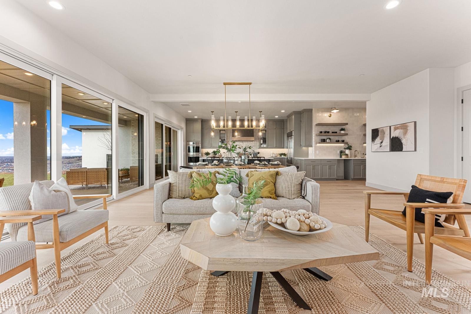 Living room featuring light wood finished floors and recessed lighting