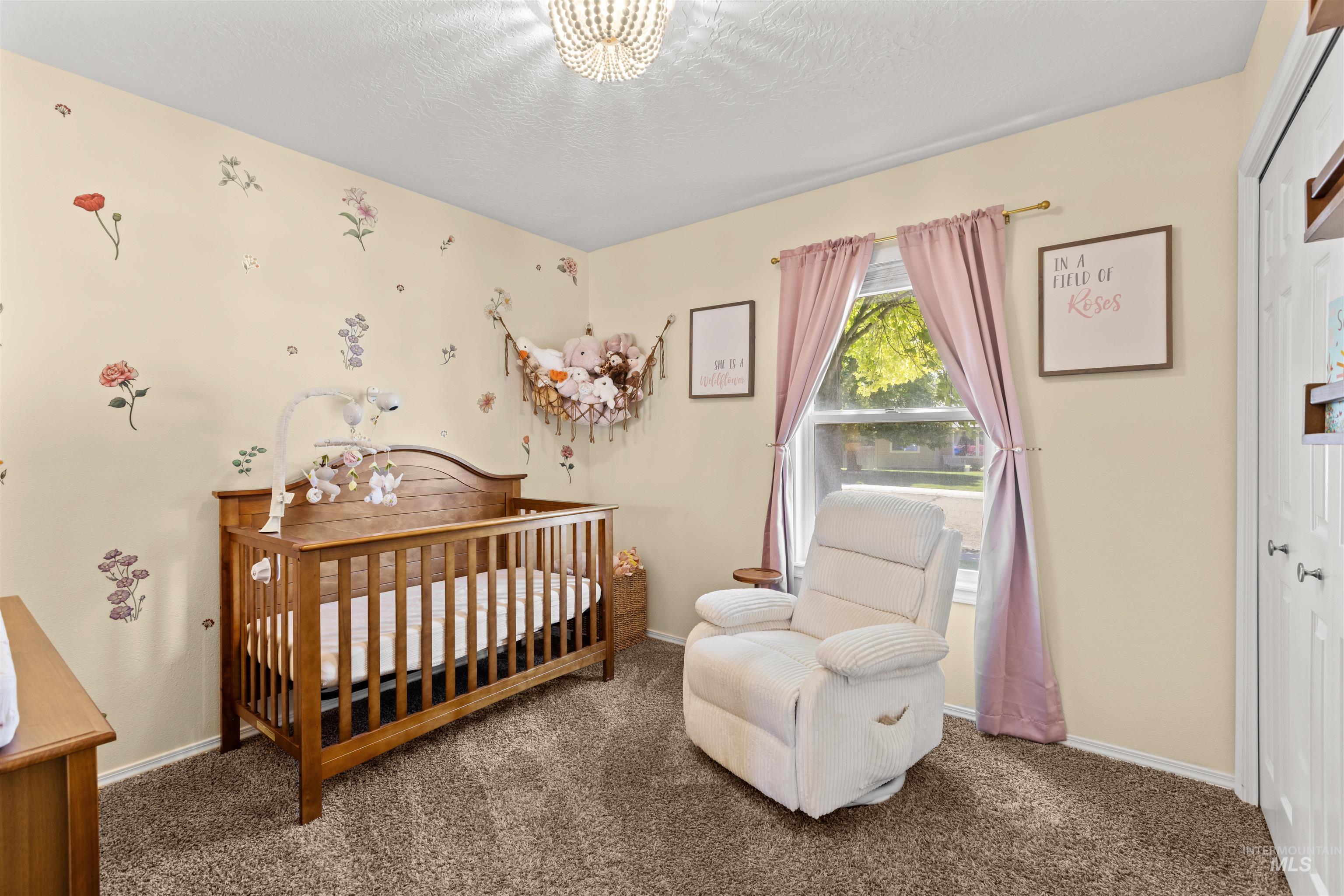 Cream-colored walls with floral wall decals