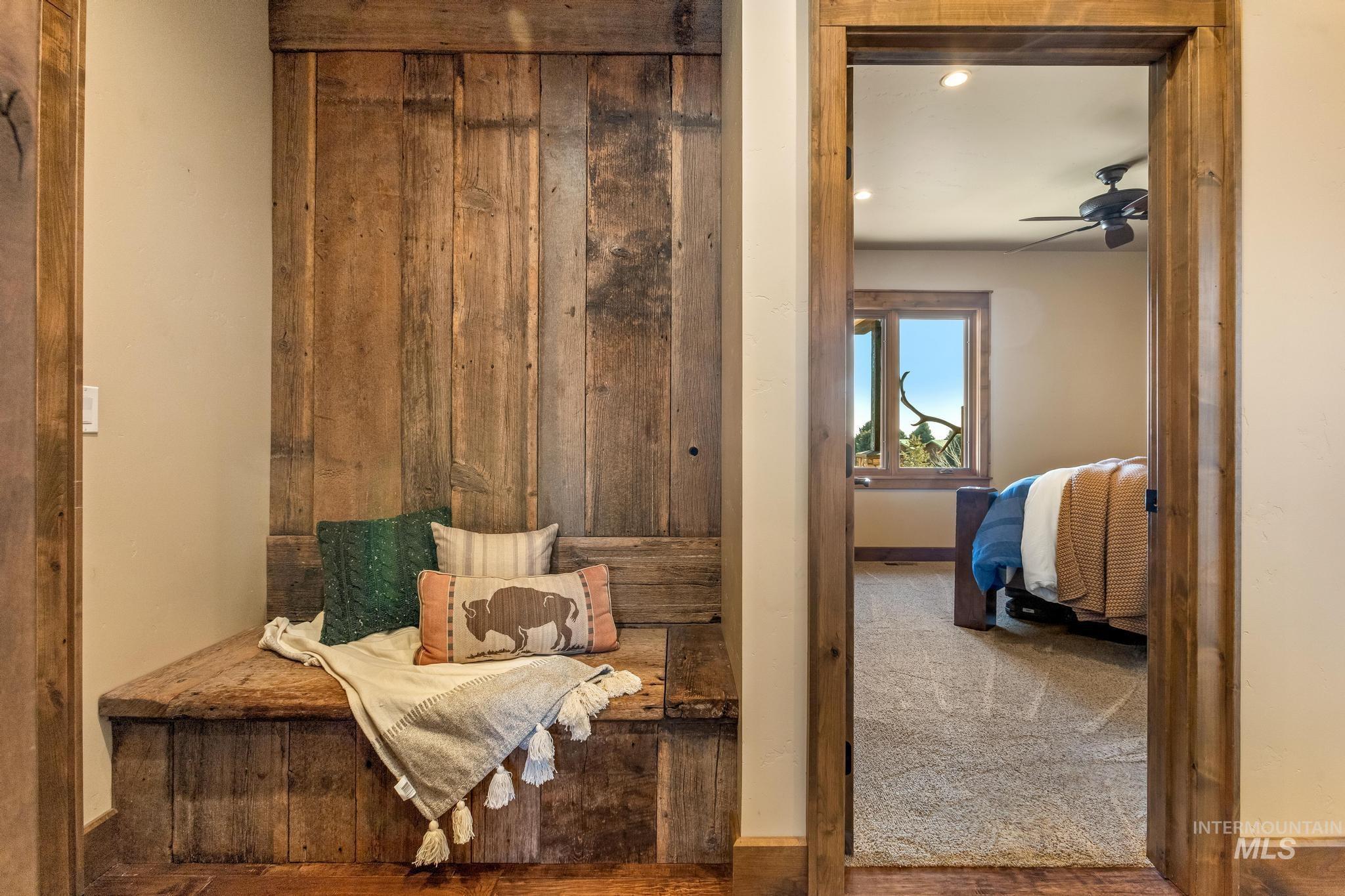 Hallway was with custom storage bench made with 1900's reclaimed barnwood.
