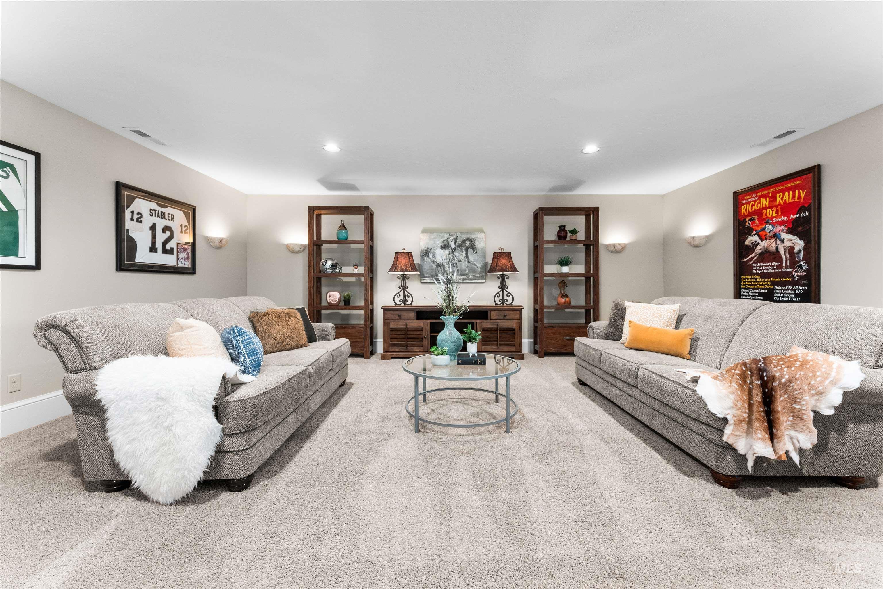 Living area featuring carpet flooring and recessed lighting
