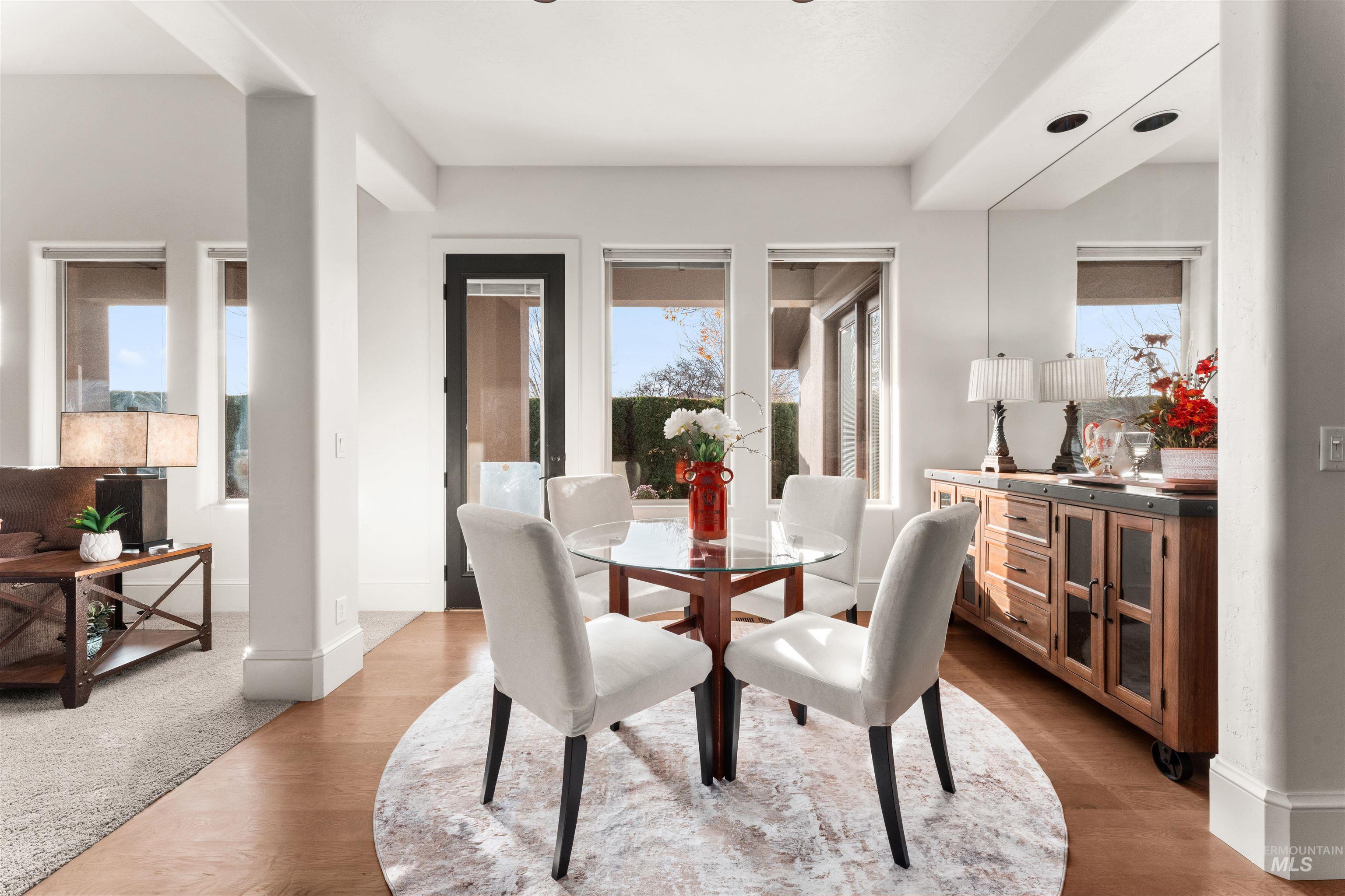 Dining room with baseboards and light wood-type flooring