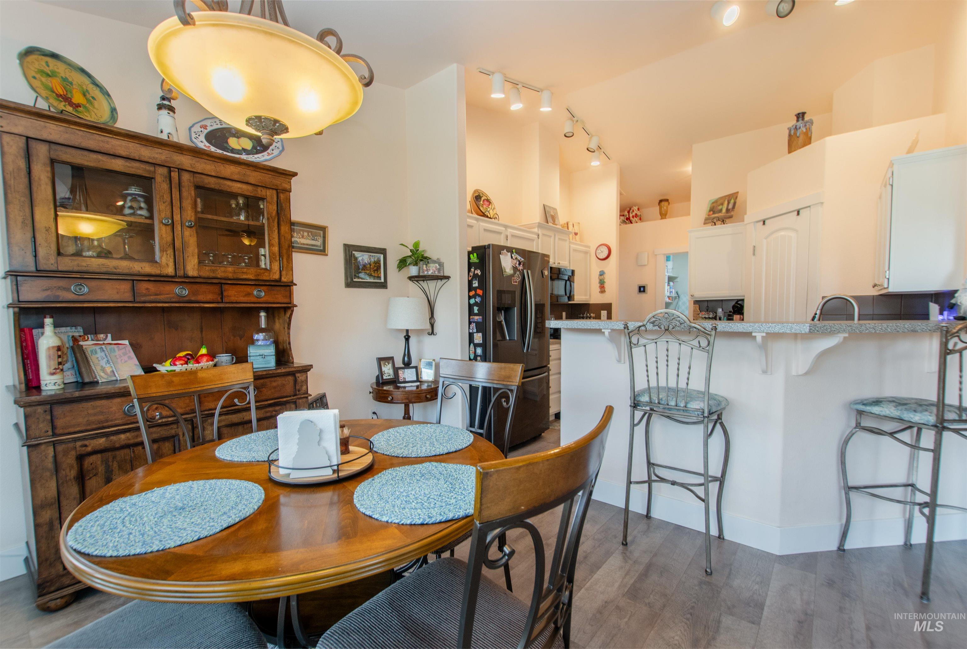Dining room featuring light wood finished floors