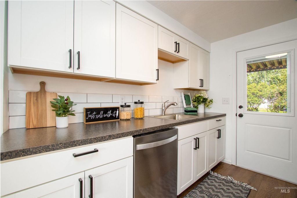 Photo of 665 S 13th East, Mountain Home, ID 83647 (MLS # 98986123)