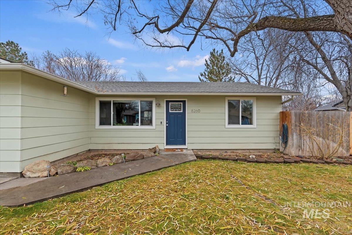 View of front of property featuring roof with shingles