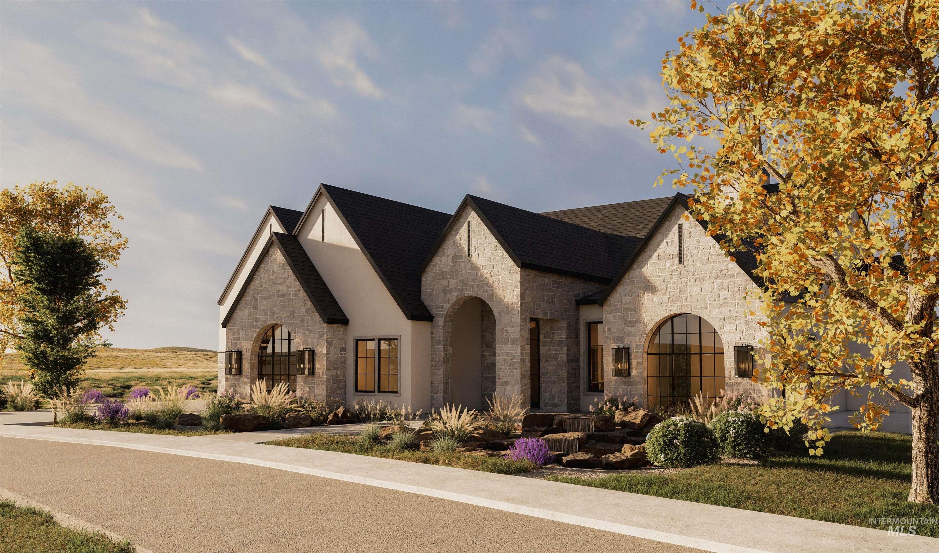 French country inspired facade with stone siding