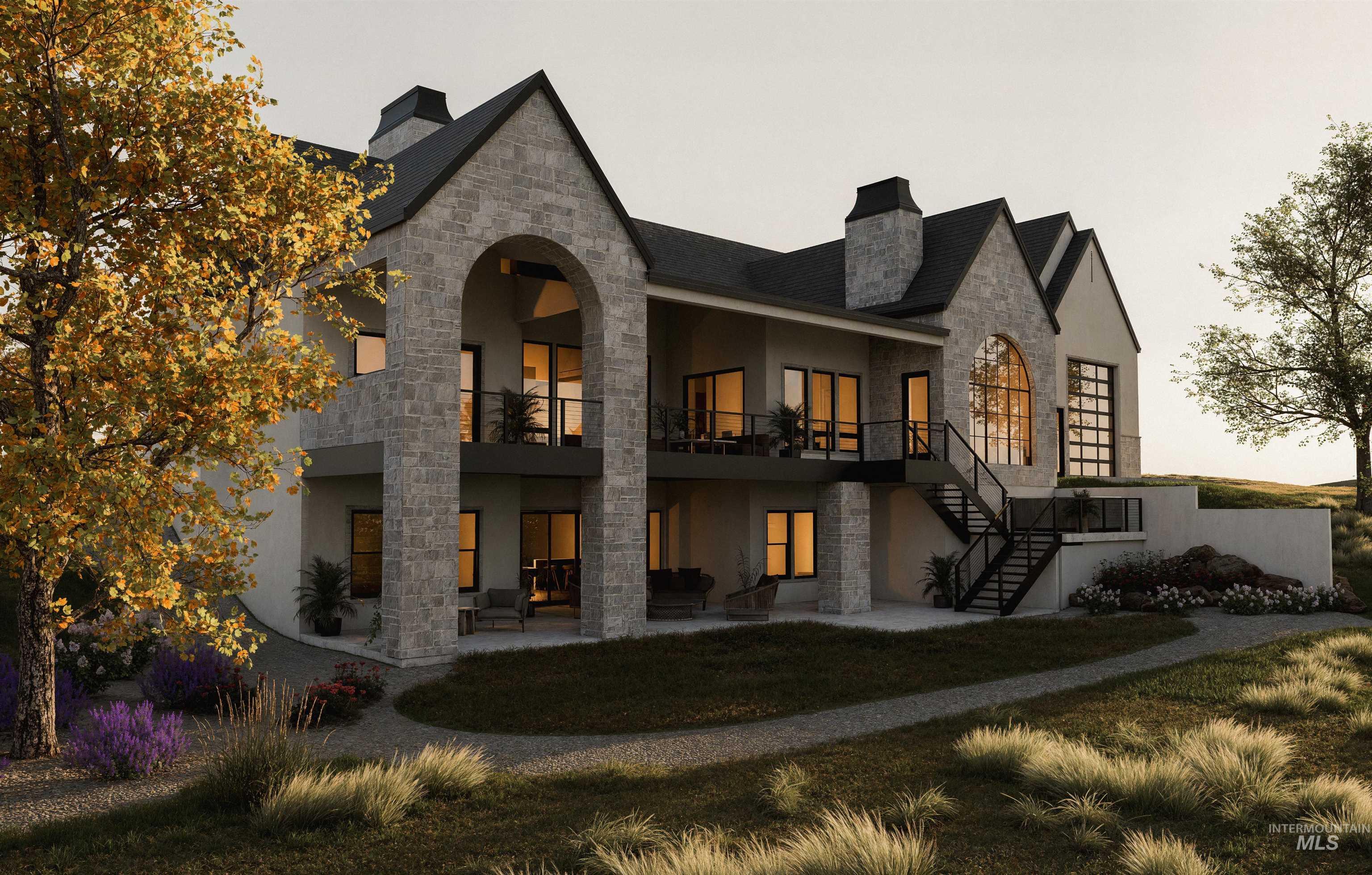 Rear view of property featuring stone siding, stairs, a chimney, a patio area, and stucco siding
