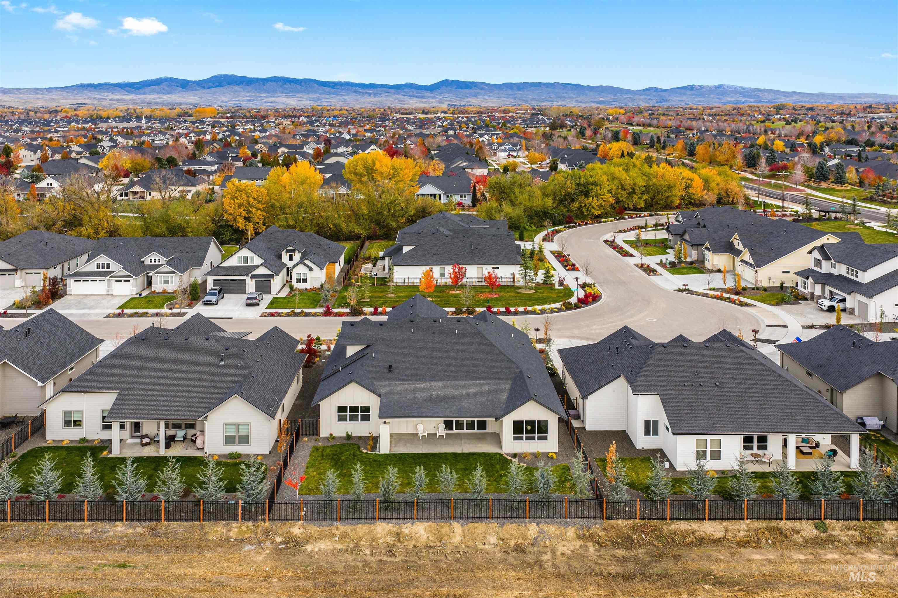 Aerial perspective of suburban area with mountains