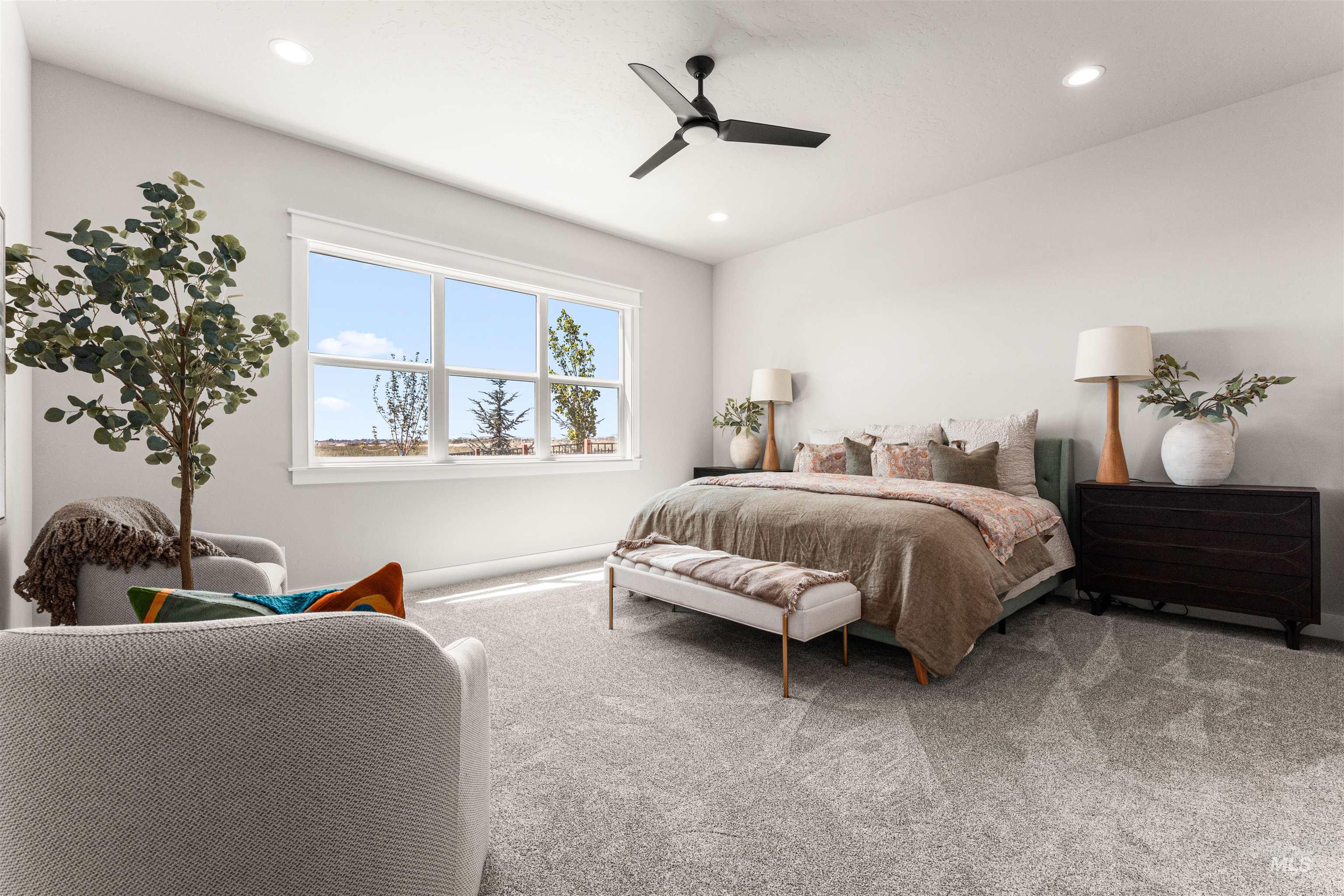 Carpeted bedroom with recessed lighting and a ceiling fan