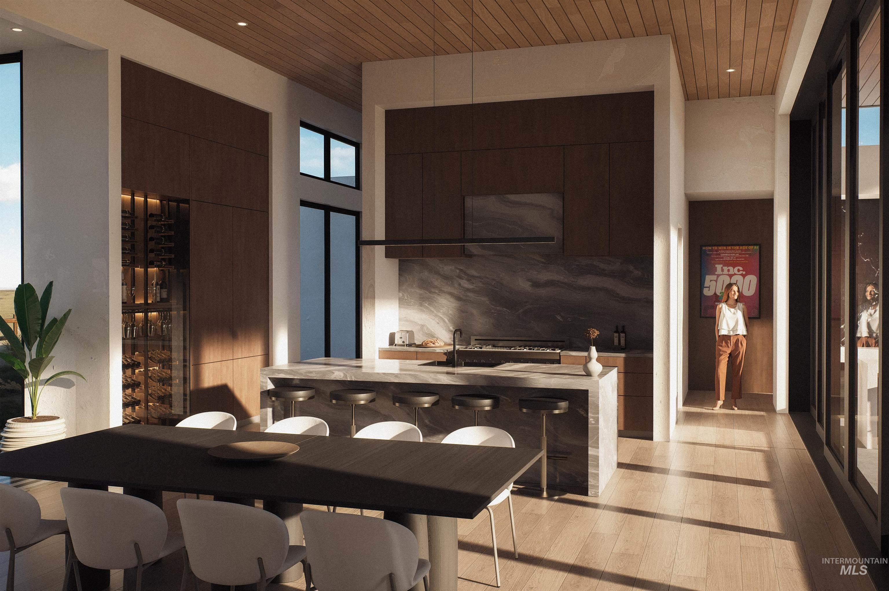 Dining room featuring light wood-style flooring, a high wooden ceiling, and recessed lighting