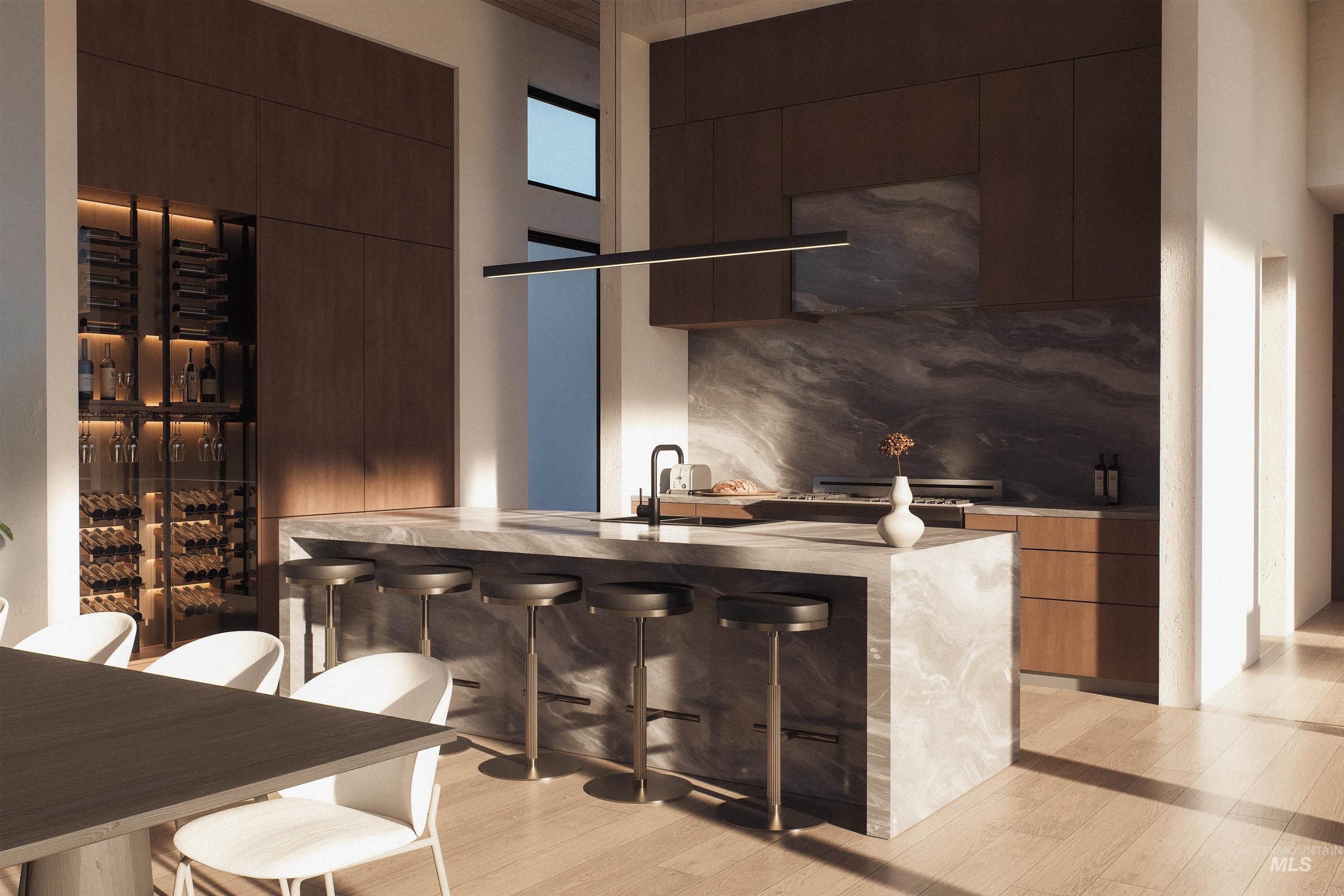 Kitchen with modern cabinets, dark wood finish cabinetry, a kitchen breakfast bar, and a high ceiling