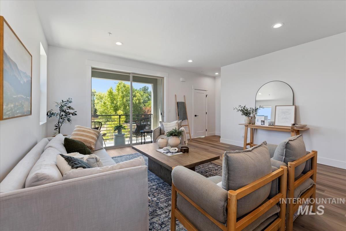 Living area featuring recessed lighting and wood finished floors
