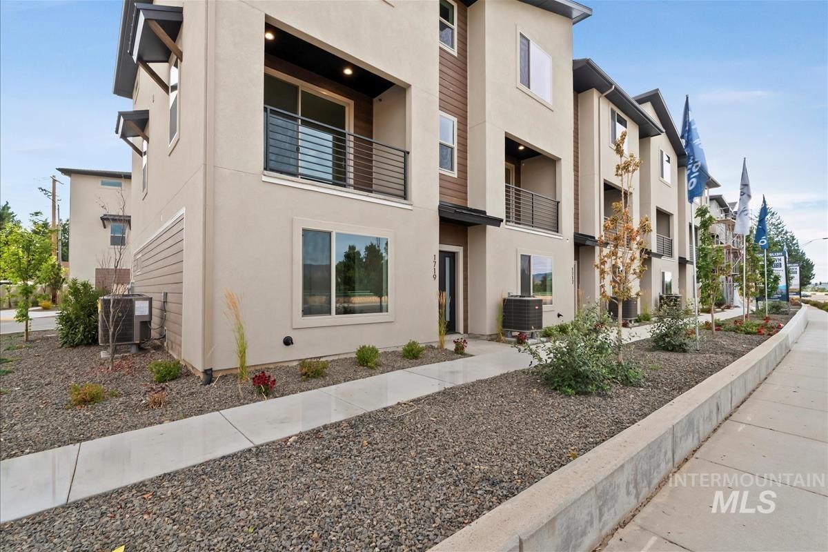 View of building exterior featuring a residential view