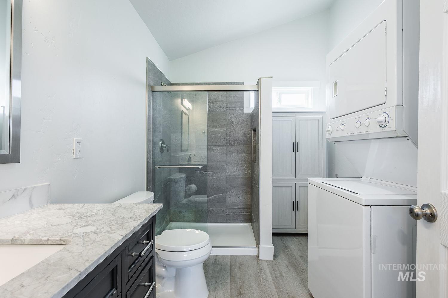 Walk-in shower, washer, and dryer