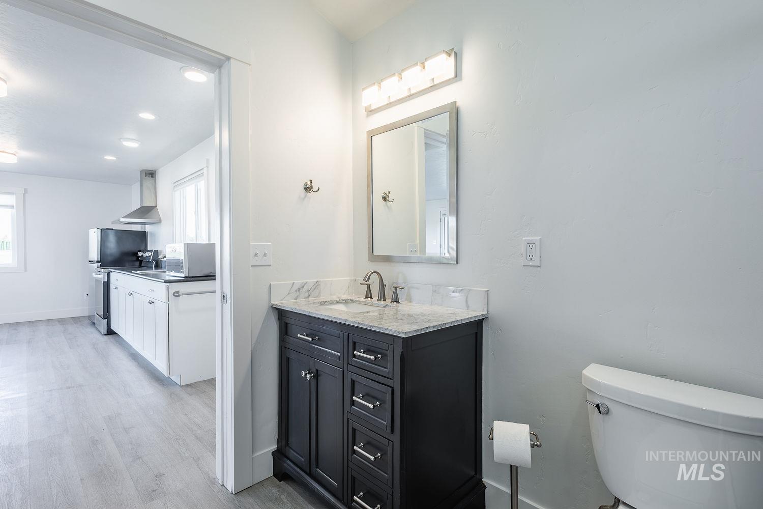 Walk-in shower, washer, and dryer