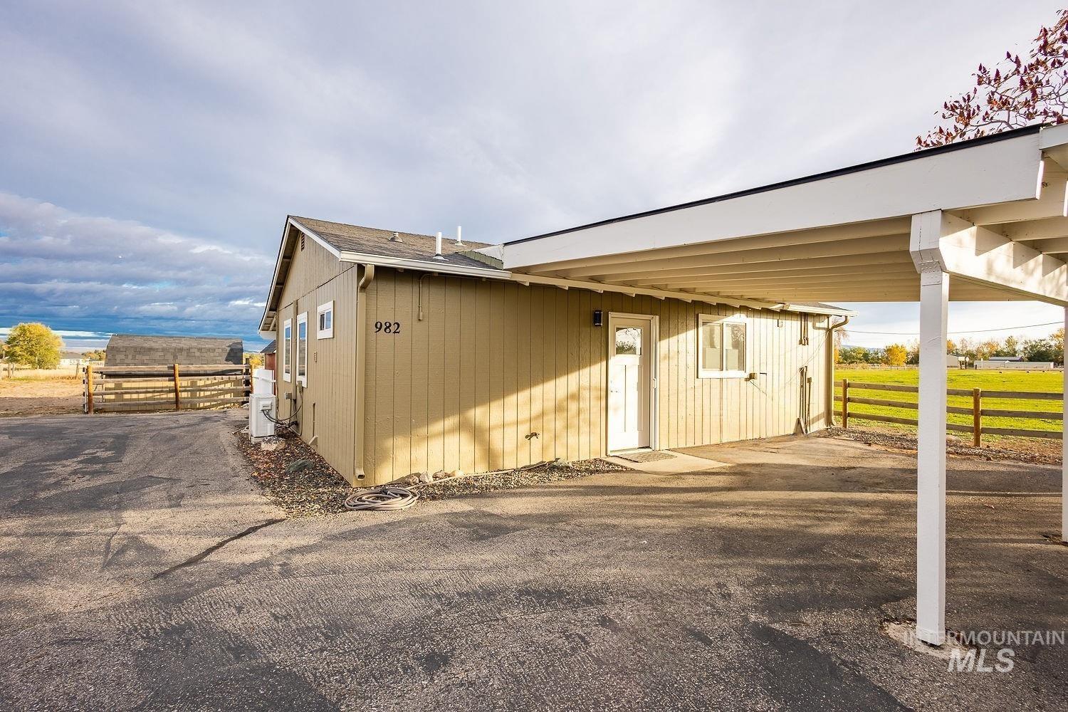 View of home's exterior with an ac unit