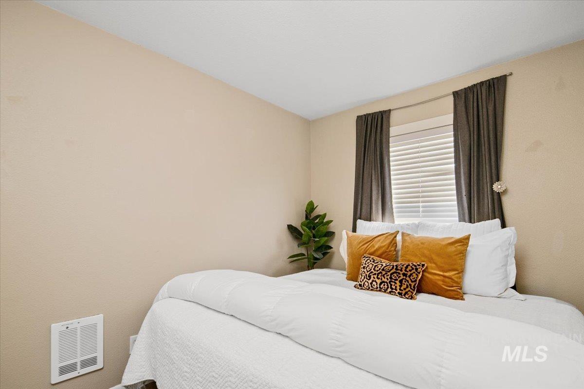 Bedroom with heating unit